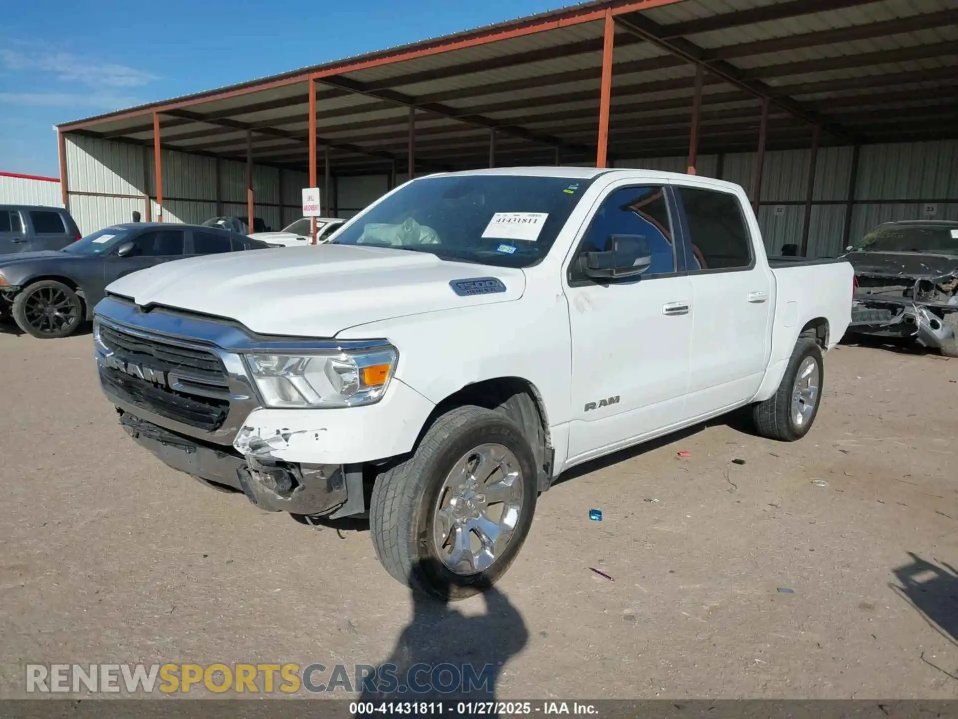 2 Photograph of a damaged car 1C6SRFFTXKN546790 RAM 1500 2019