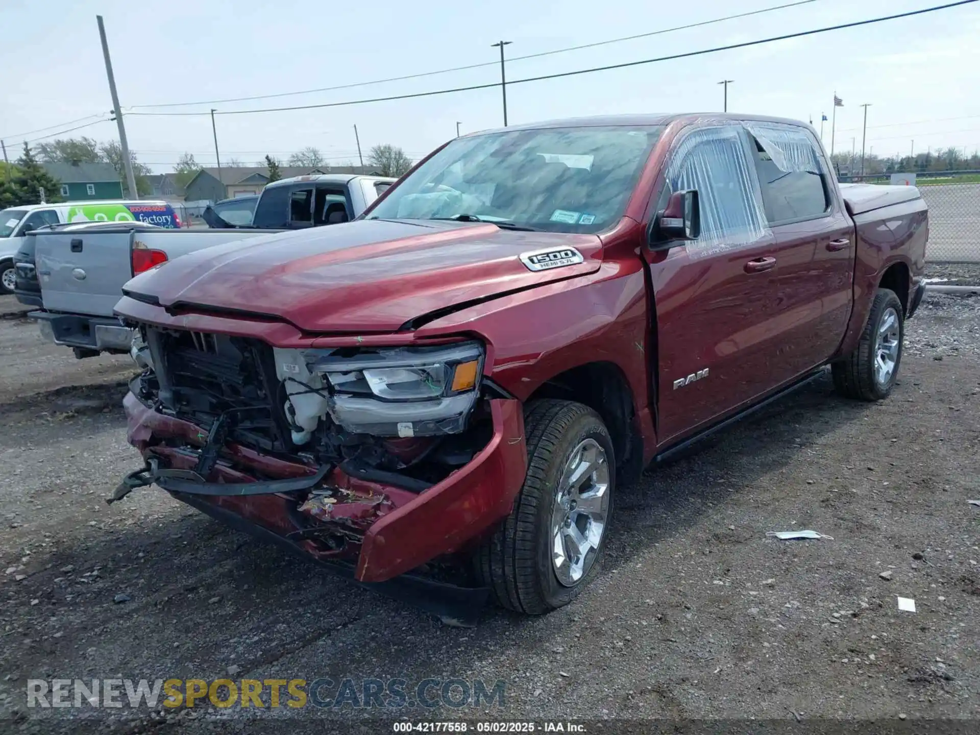 2 Photograph of a damaged car 1C6SRFFTXKN726125 RAM 1500 2019