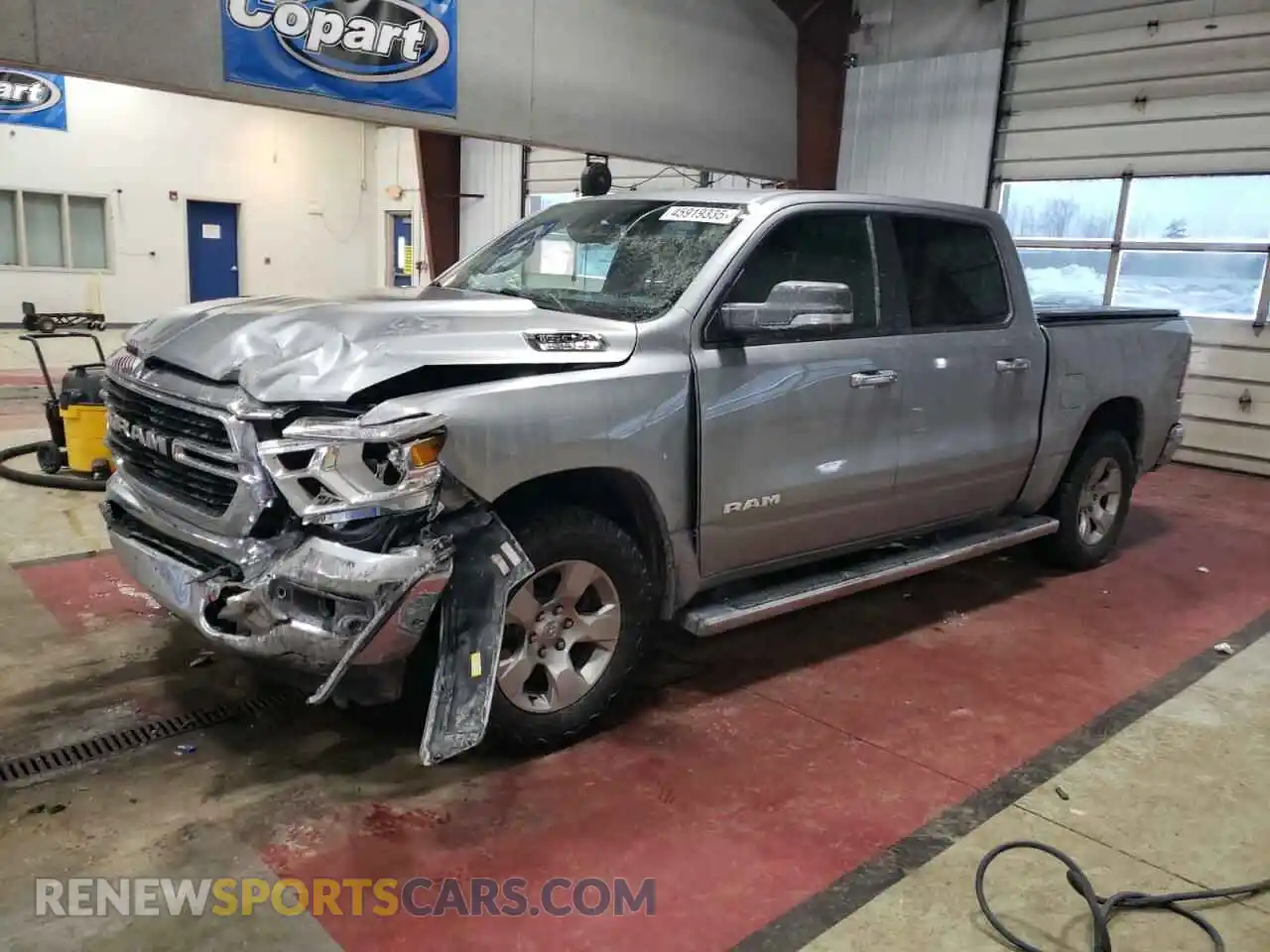 1 Photograph of a damaged car 1C6SRFFTXKN734516 RAM 1500 2019