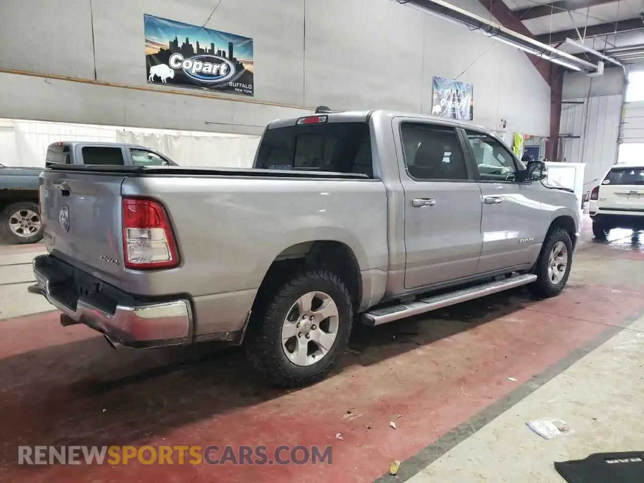 3 Photograph of a damaged car 1C6SRFFTXKN734516 RAM 1500 2019