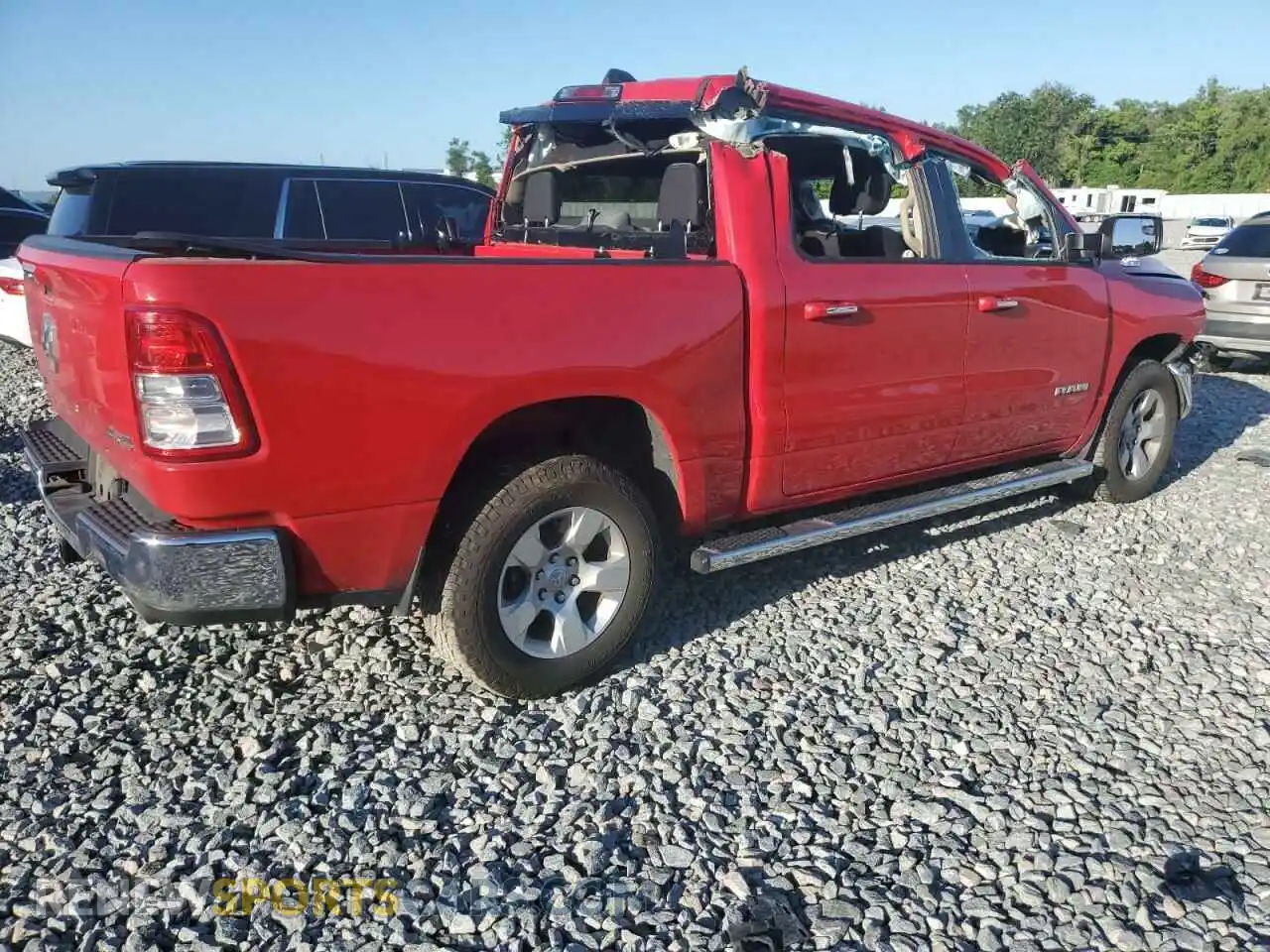 3 Photograph of a damaged car 1C6SRFFTXKN854008 RAM 1500 2019