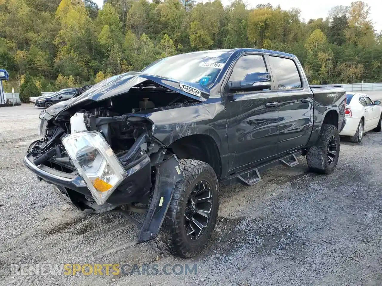1 Photograph of a damaged car 1C6SRFFTXKN885968 RAM 1500 2019