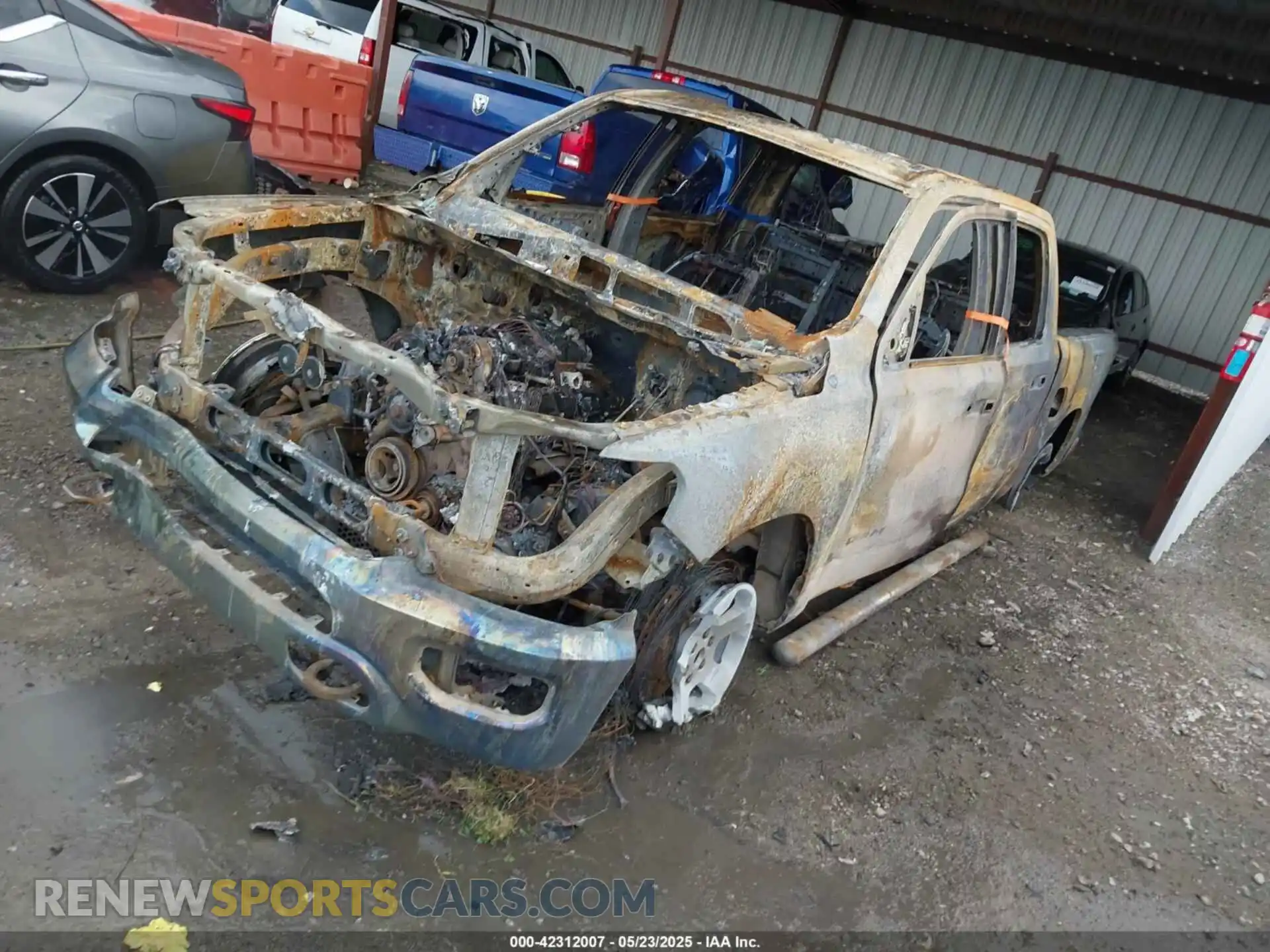 2 Photograph of a damaged car 1C6SRFGT2KN591334 RAM 1500 2019
