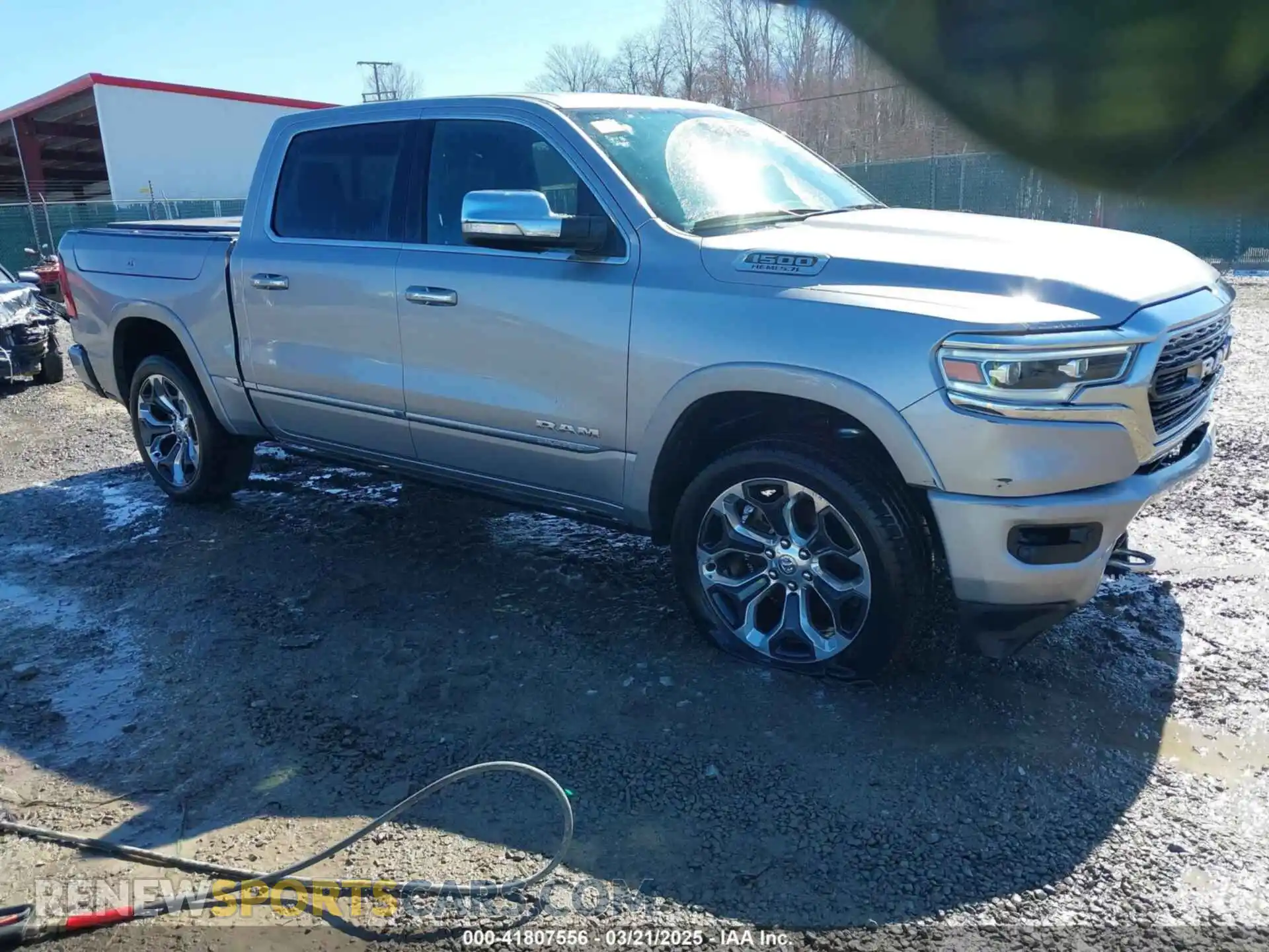 1 Photograph of a damaged car 1C6SRFHT3KN755009 RAM 1500 2019
