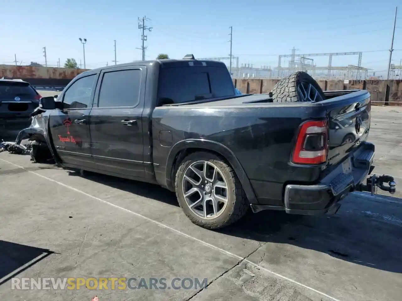 2 Photograph of a damaged car 1C6SRFHT6KN566564 RAM 1500 2019