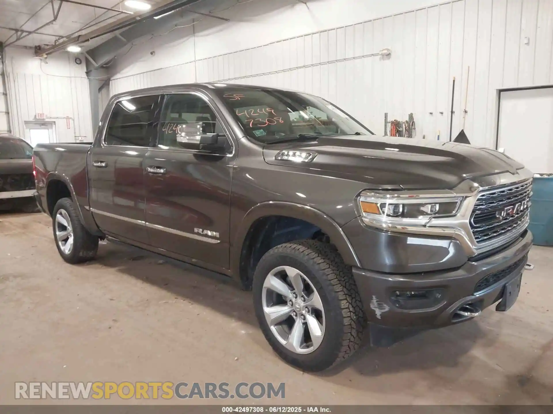 1 Photograph of a damaged car 1C6SRFHT6KN732727 RAM 1500 2019