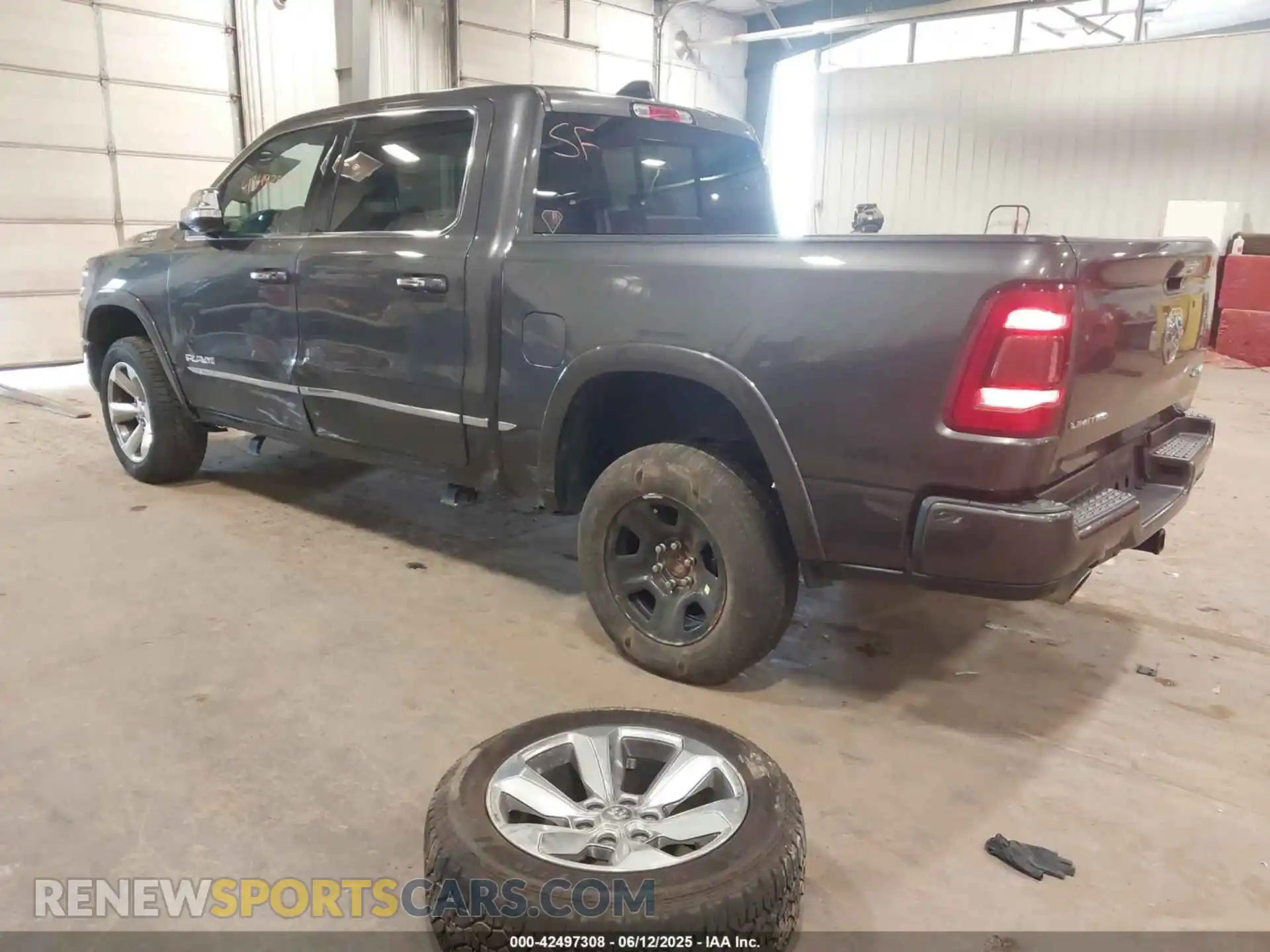 3 Photograph of a damaged car 1C6SRFHT6KN732727 RAM 1500 2019
