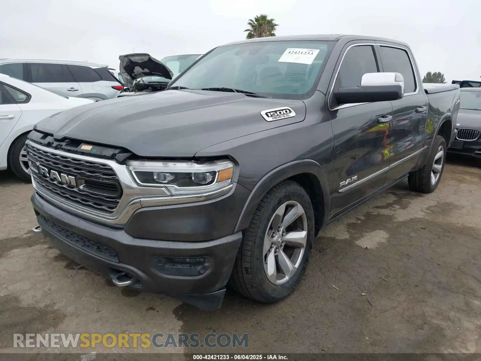 2 Photograph of a damaged car 1C6SRFHT6KN773195 RAM 1500 2019
