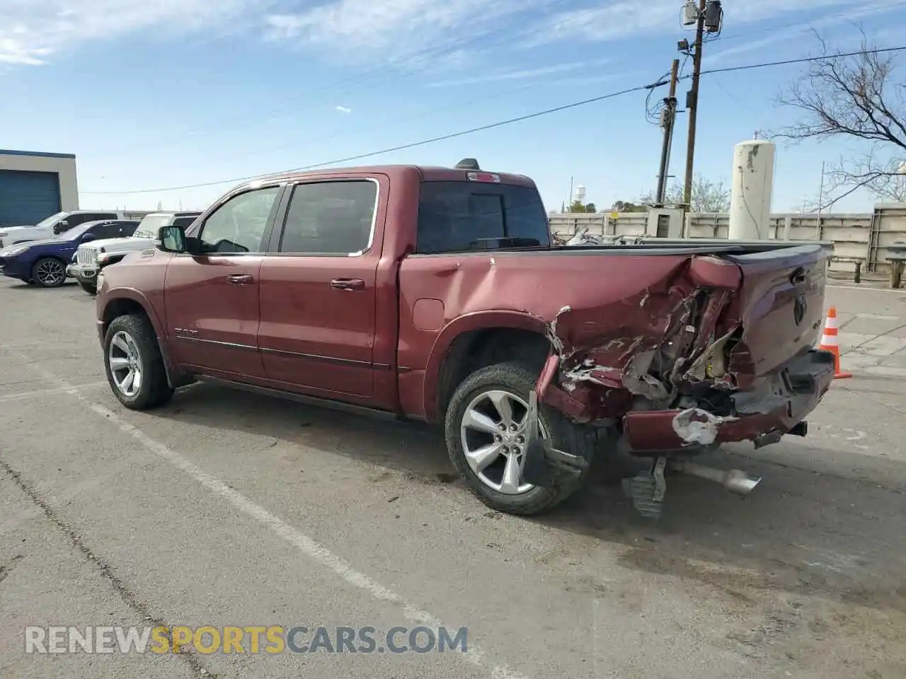 2 Photograph of a damaged car 1C6SRFHT6KN802033 RAM 1500 2019