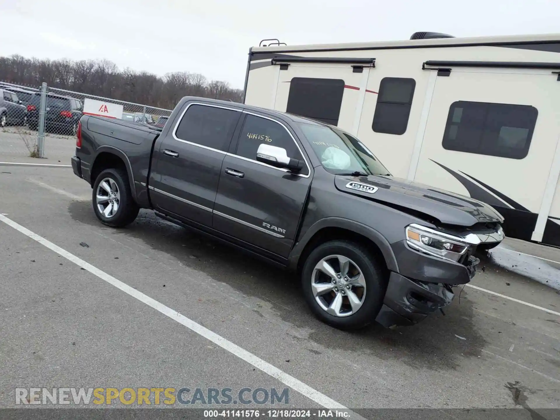 1 Photograph of a damaged car 1C6SRFHT8KN811459 RAM 1500 2019