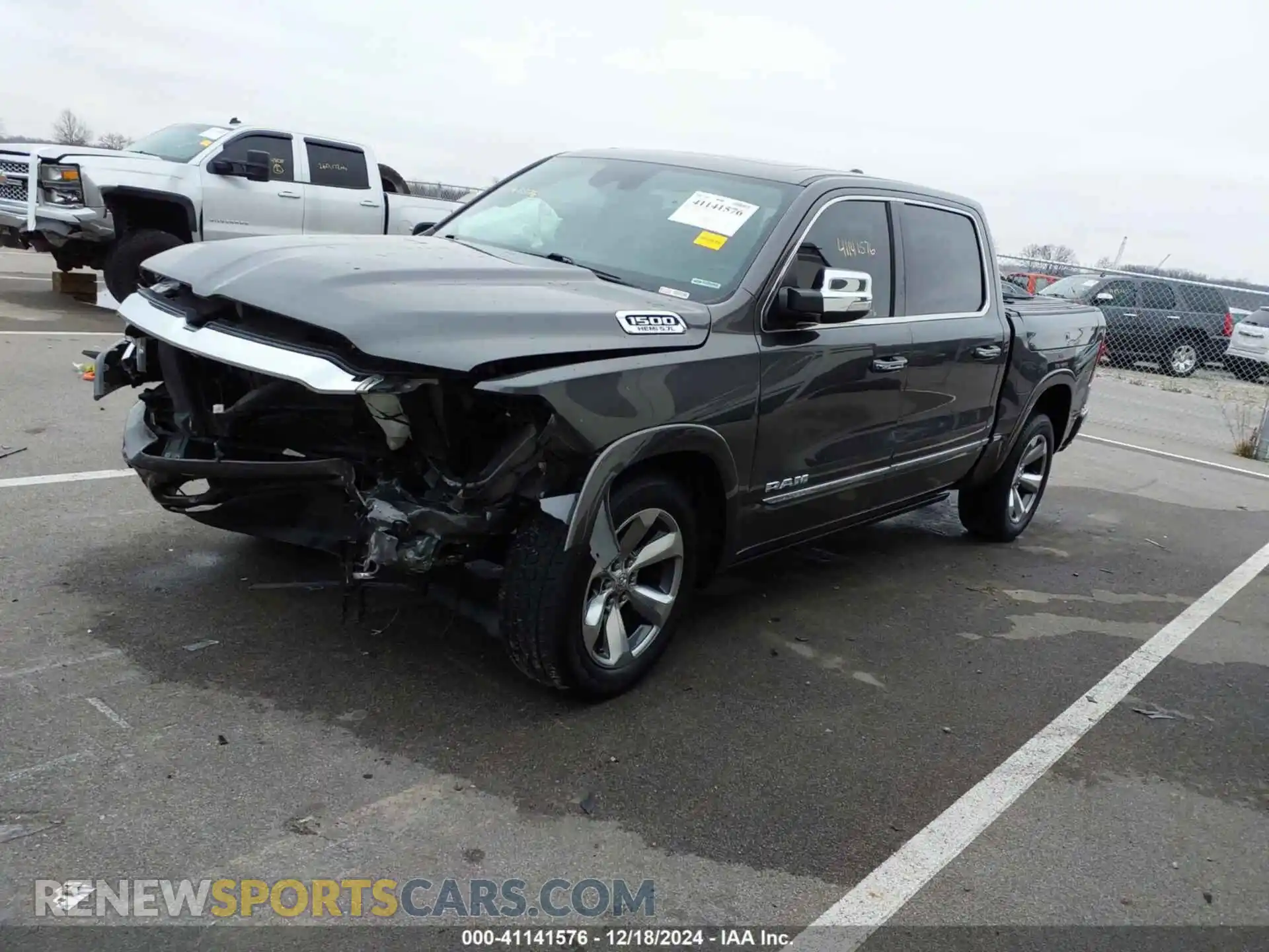 2 Photograph of a damaged car 1C6SRFHT8KN811459 RAM 1500 2019