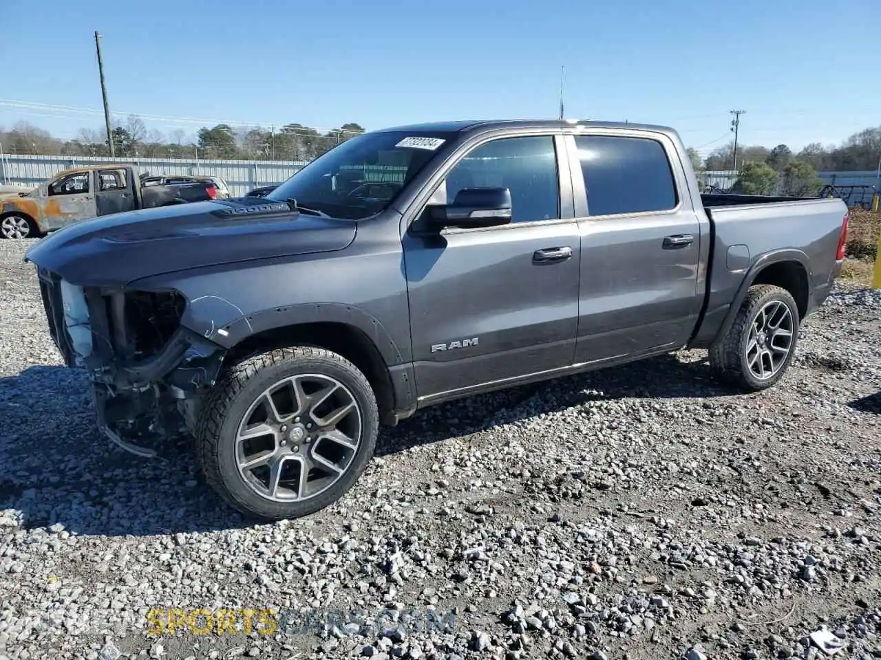 1 Photograph of a damaged car 1C6SRFJT3KN585390 RAM 1500 2019