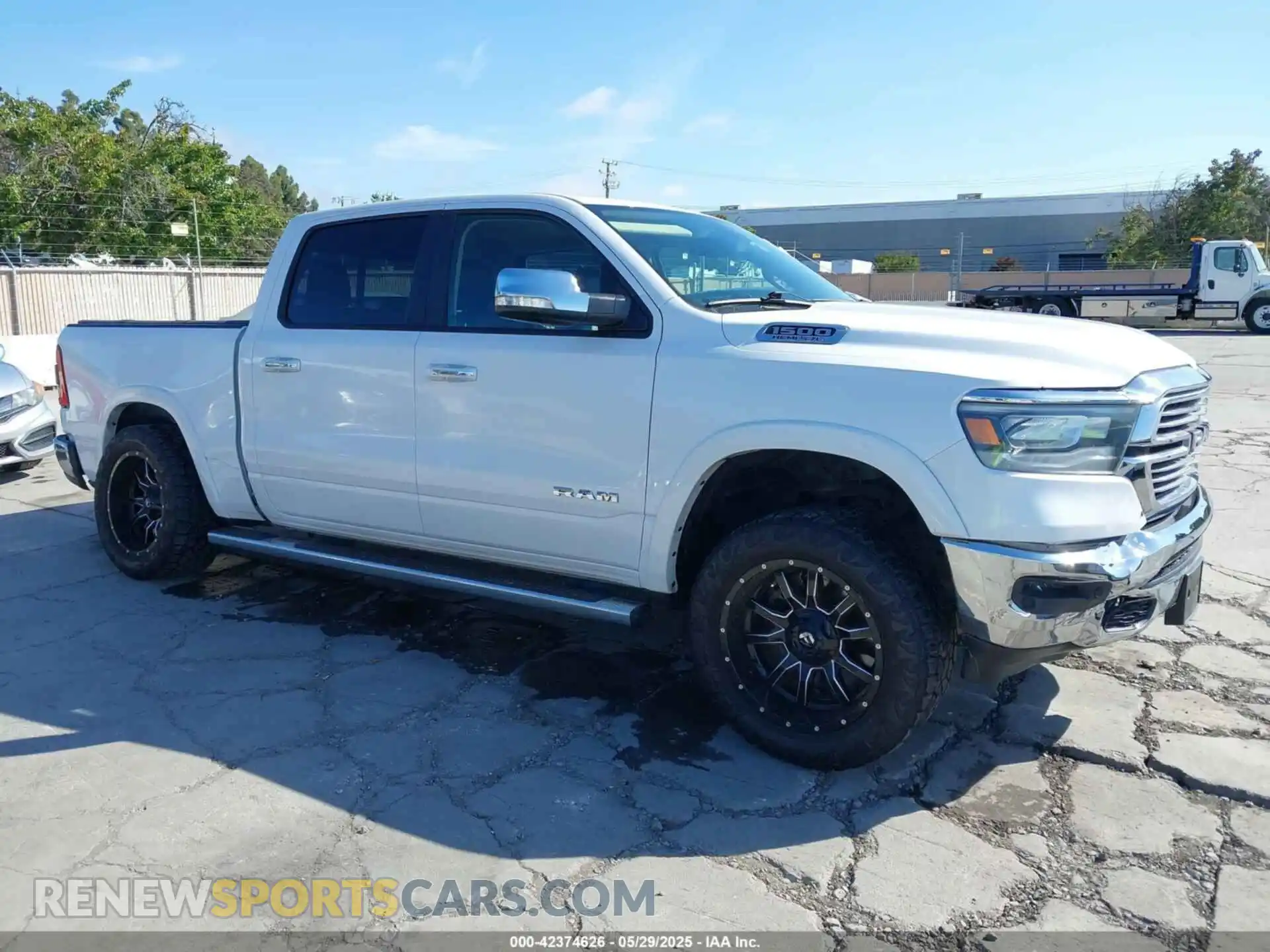 1 Photograph of a damaged car 1C6SRFJT5KN760383 RAM 1500 2019