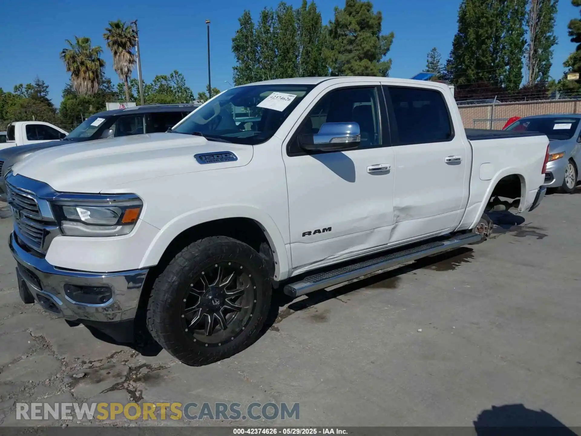 2 Photograph of a damaged car 1C6SRFJT5KN760383 RAM 1500 2019