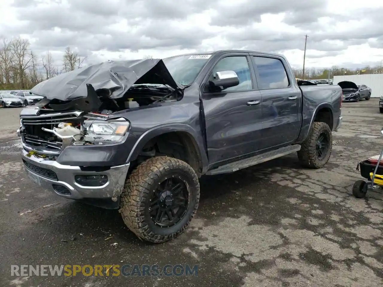 1 Photograph of a damaged car 1C6SRFJT7KN907979 RAM 1500 2019
