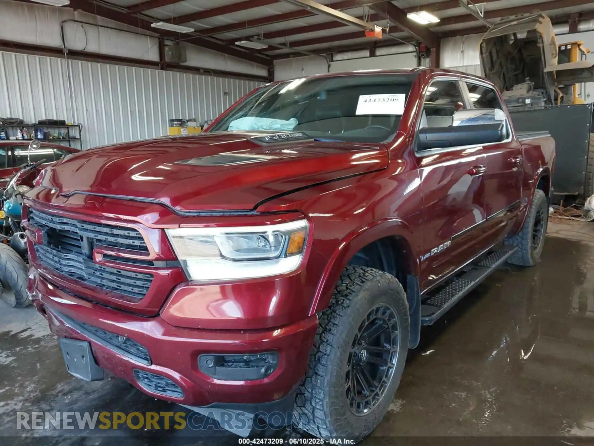 2 Photograph of a damaged car 1C6SRFJT8KN696341 RAM 1500 2019