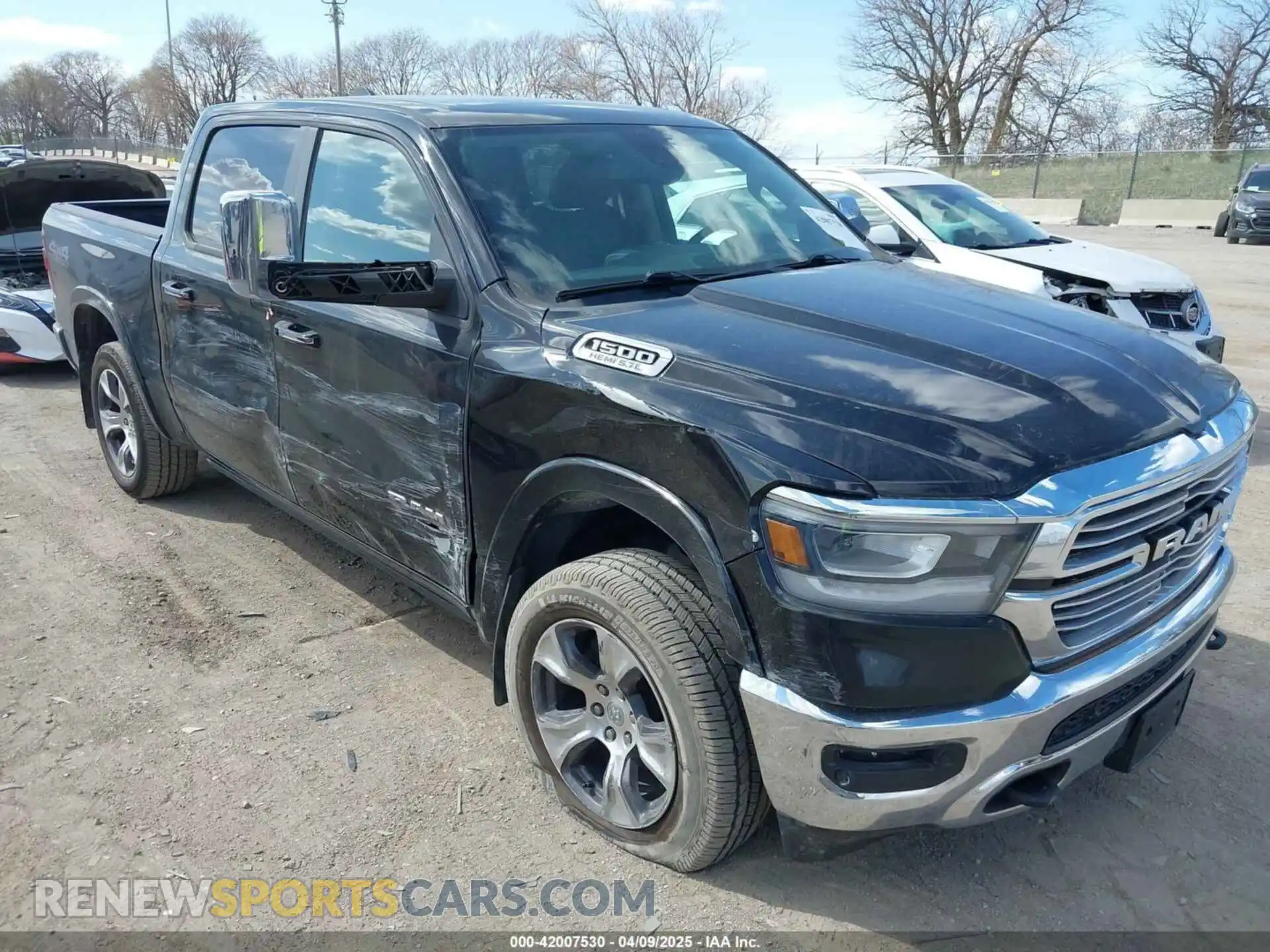 1 Photograph of a damaged car 1C6SRFJTXKN609930 RAM 1500 2019