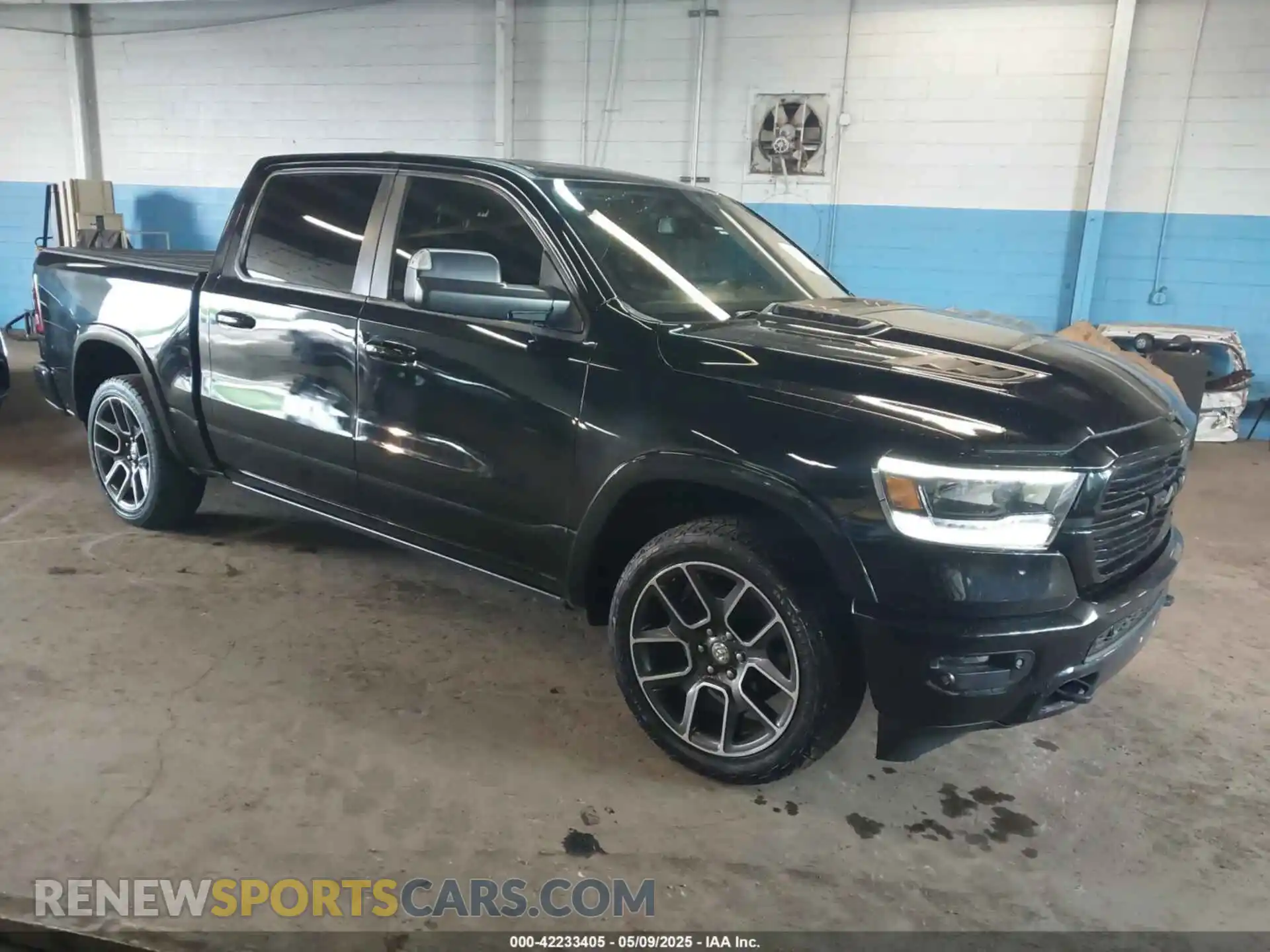 1 Photograph of a damaged car 1C6SRFJTXKN610253 RAM 1500 2019