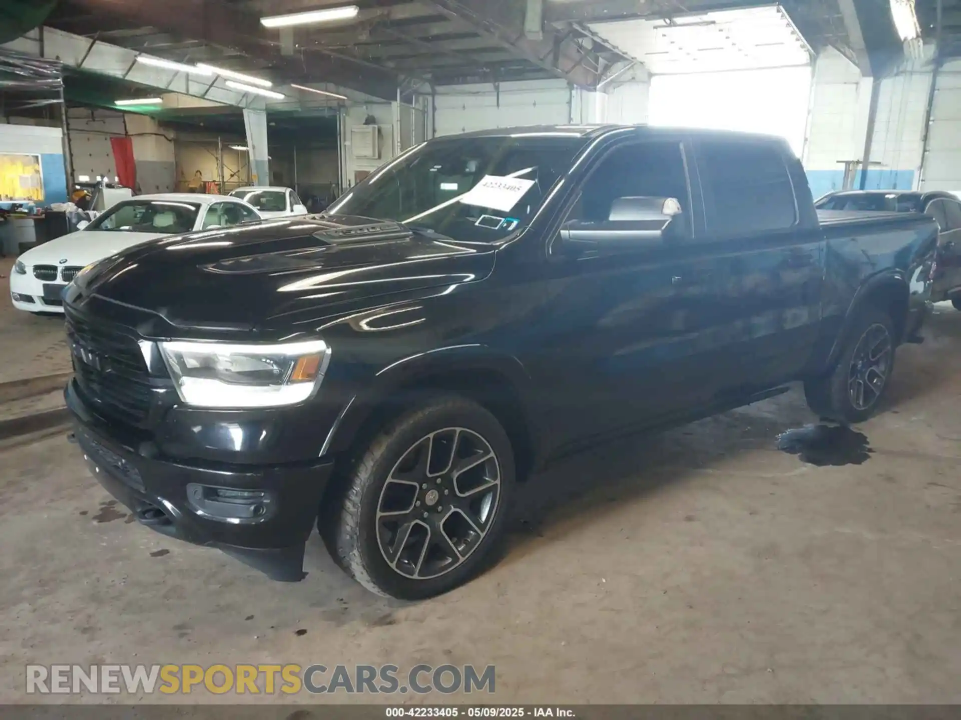 2 Photograph of a damaged car 1C6SRFJTXKN610253 RAM 1500 2019