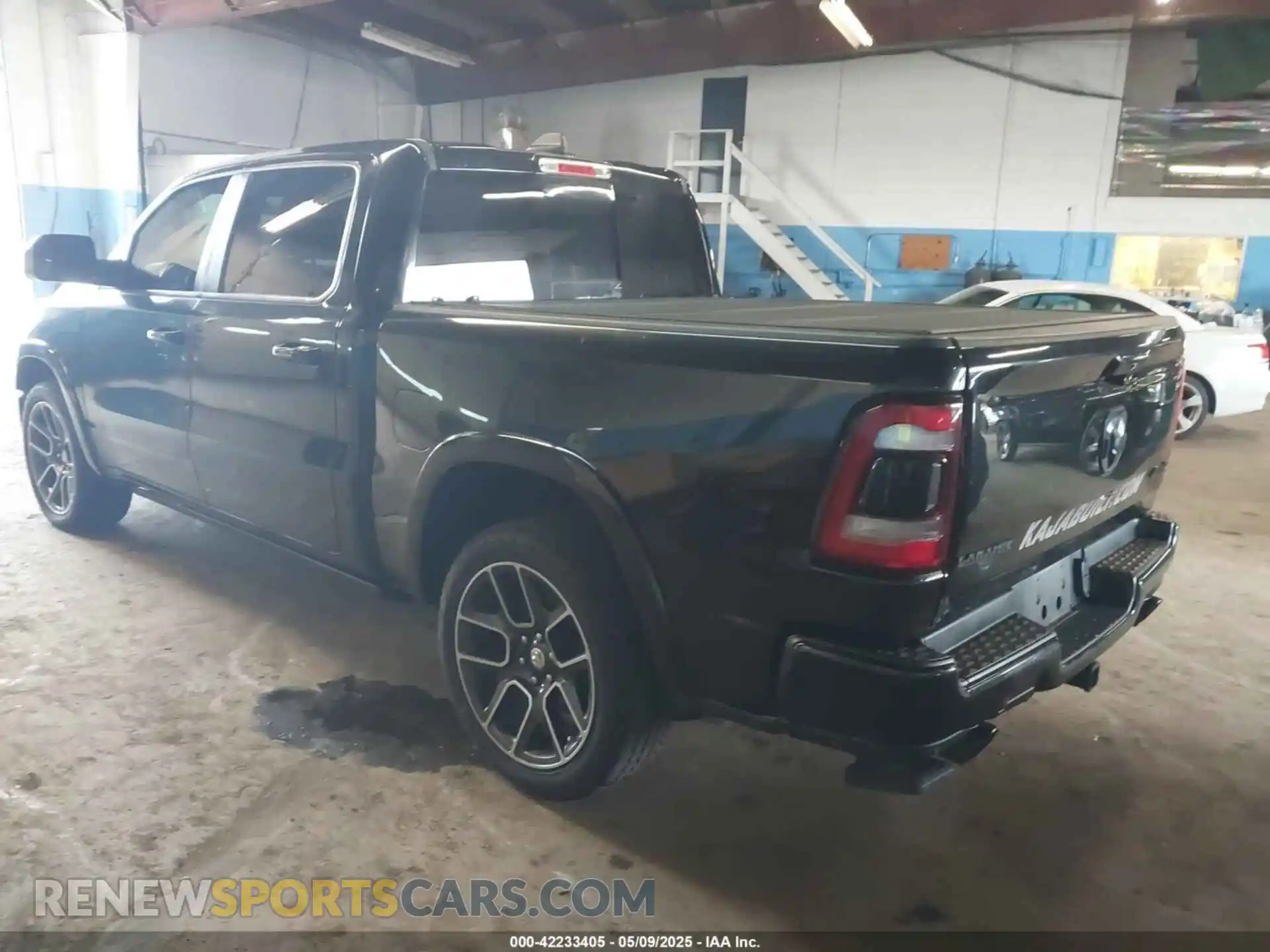 3 Photograph of a damaged car 1C6SRFJTXKN610253 RAM 1500 2019
