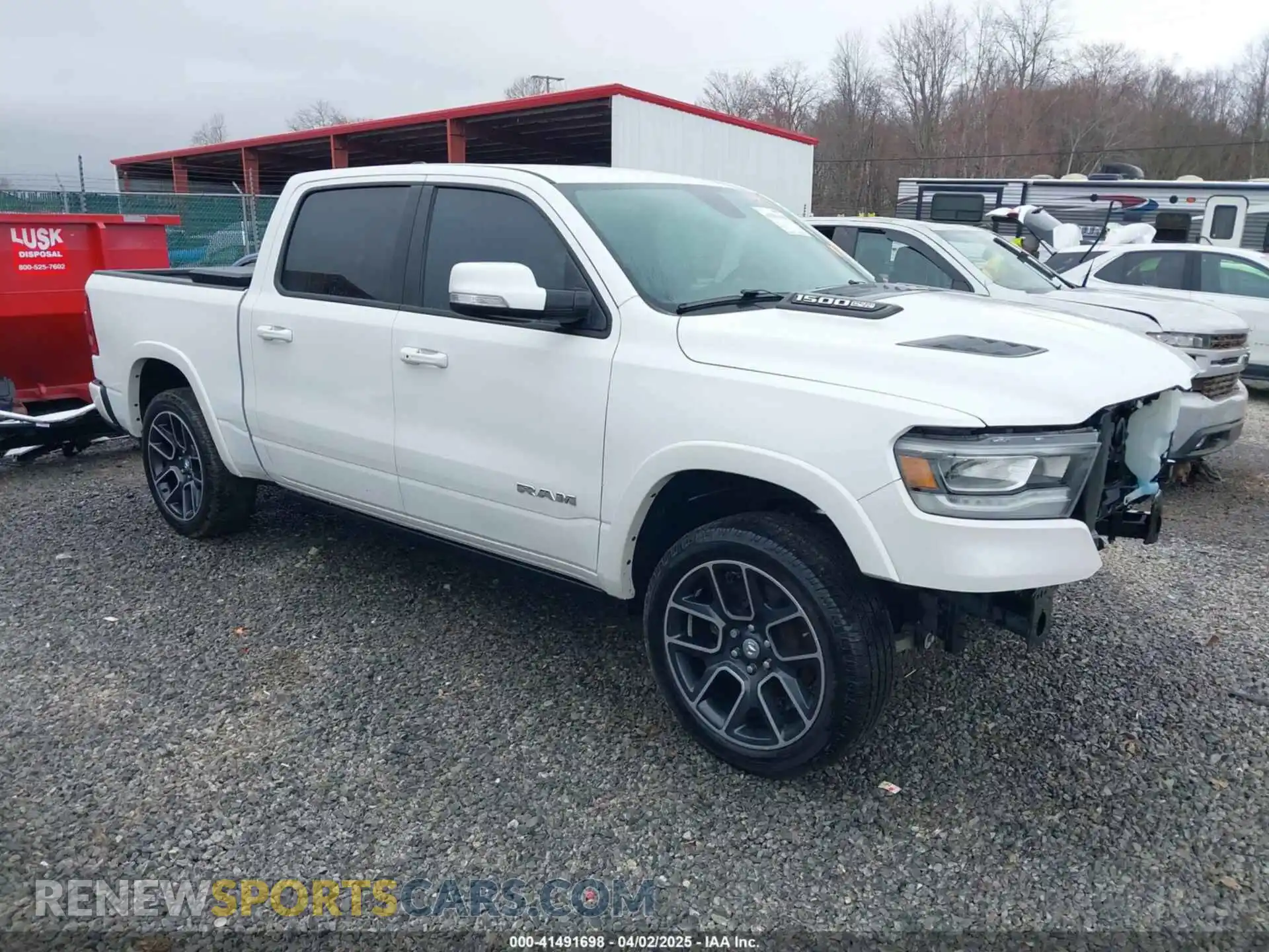 1 Photograph of a damaged car 1C6SRFJTXKN712832 RAM 1500 2019