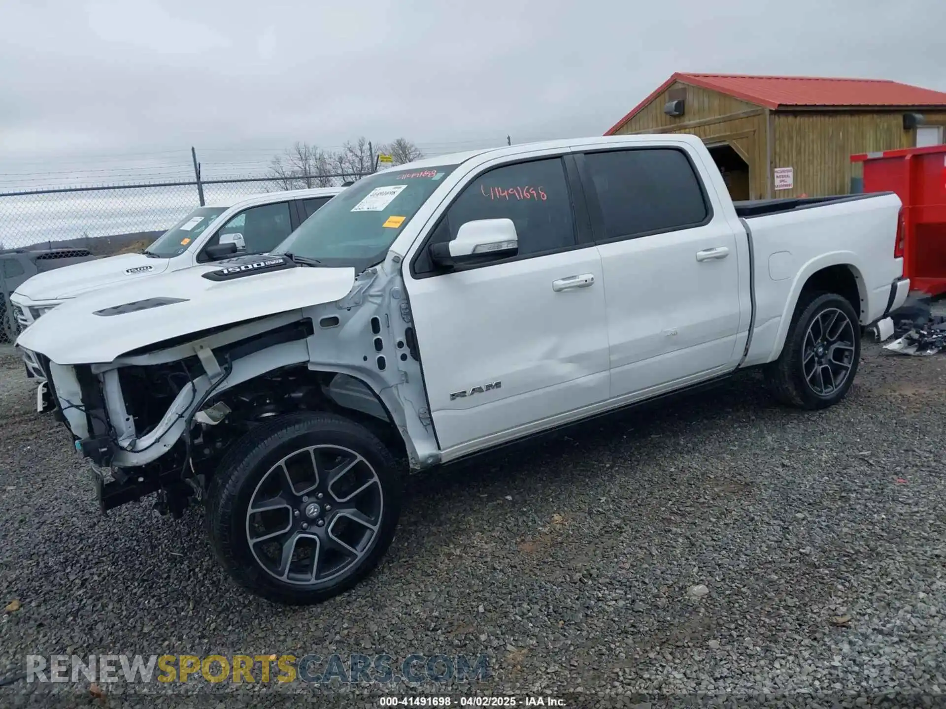 2 Photograph of a damaged car 1C6SRFJTXKN712832 RAM 1500 2019