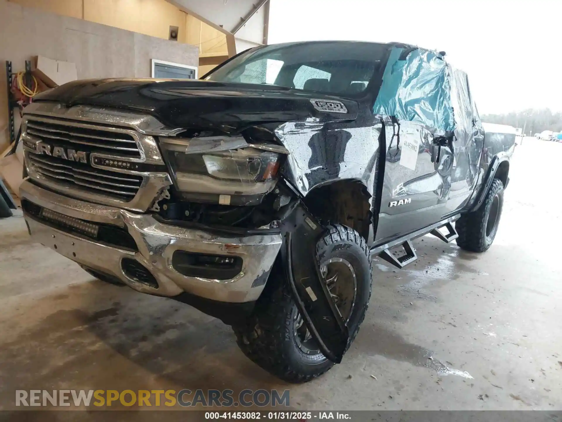 2 Photograph of a damaged car 1C6SRFJTXKN735933 RAM 1500 2019