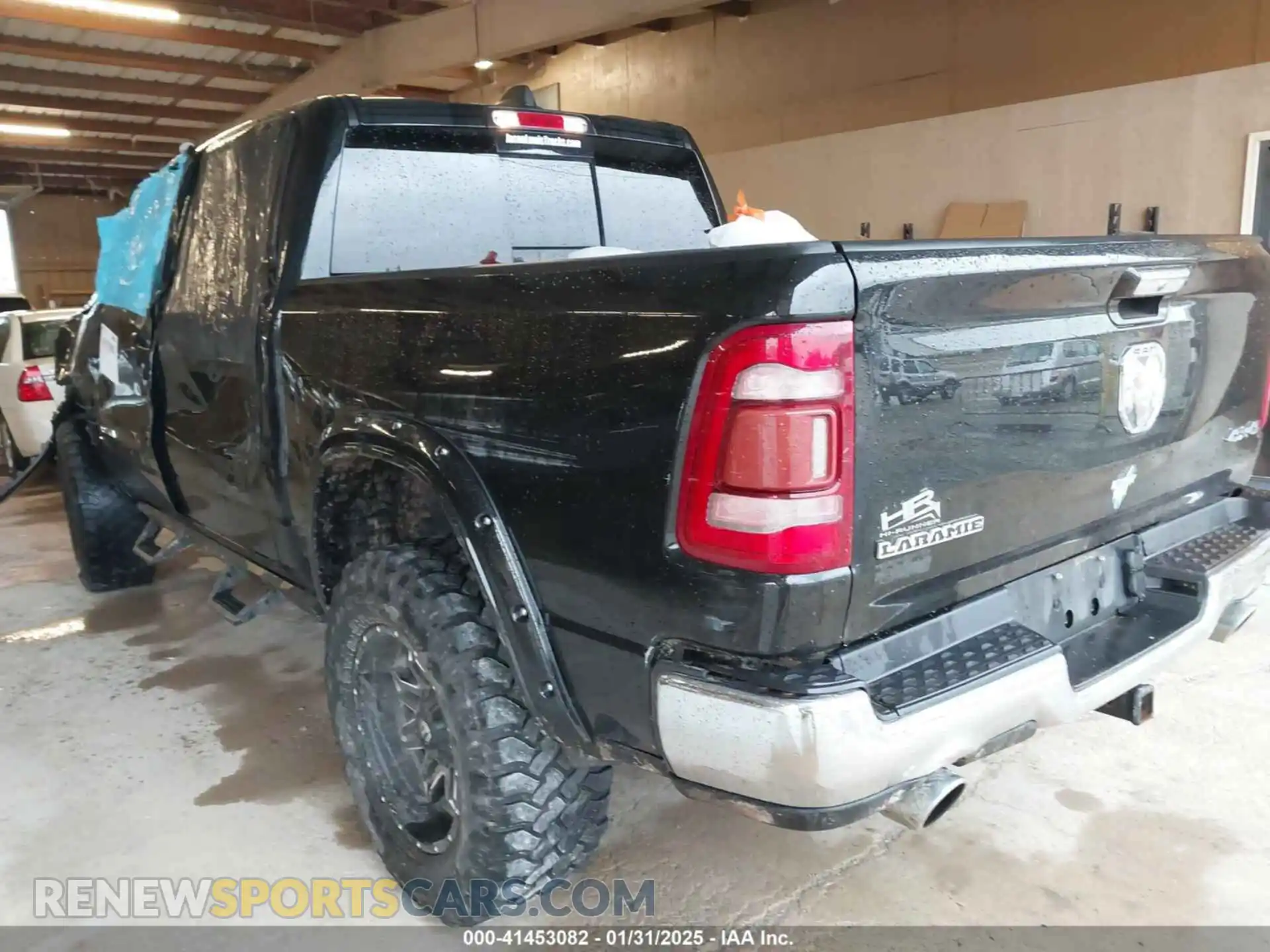 3 Photograph of a damaged car 1C6SRFJTXKN735933 RAM 1500 2019