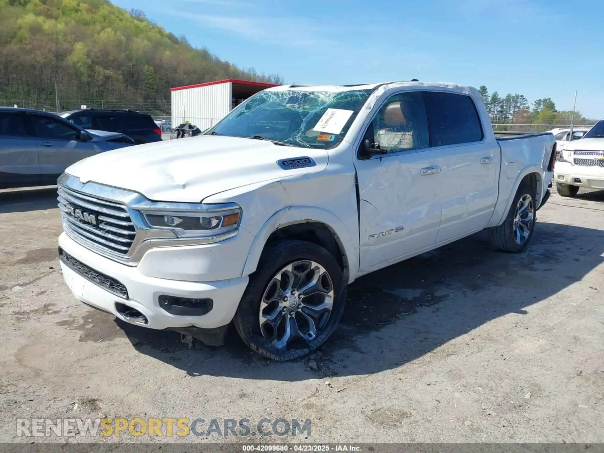 2 Photograph of a damaged car 1C6SRFKT7KN897078 RAM 1500 2019