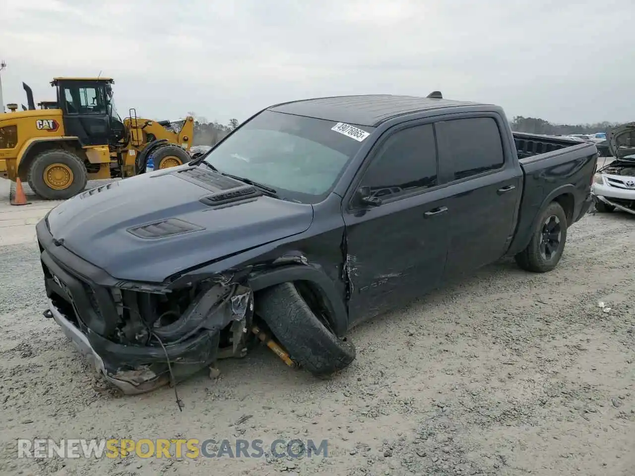 1 Photograph of a damaged car 1C6SRFLT0KN844950 RAM 1500 2019