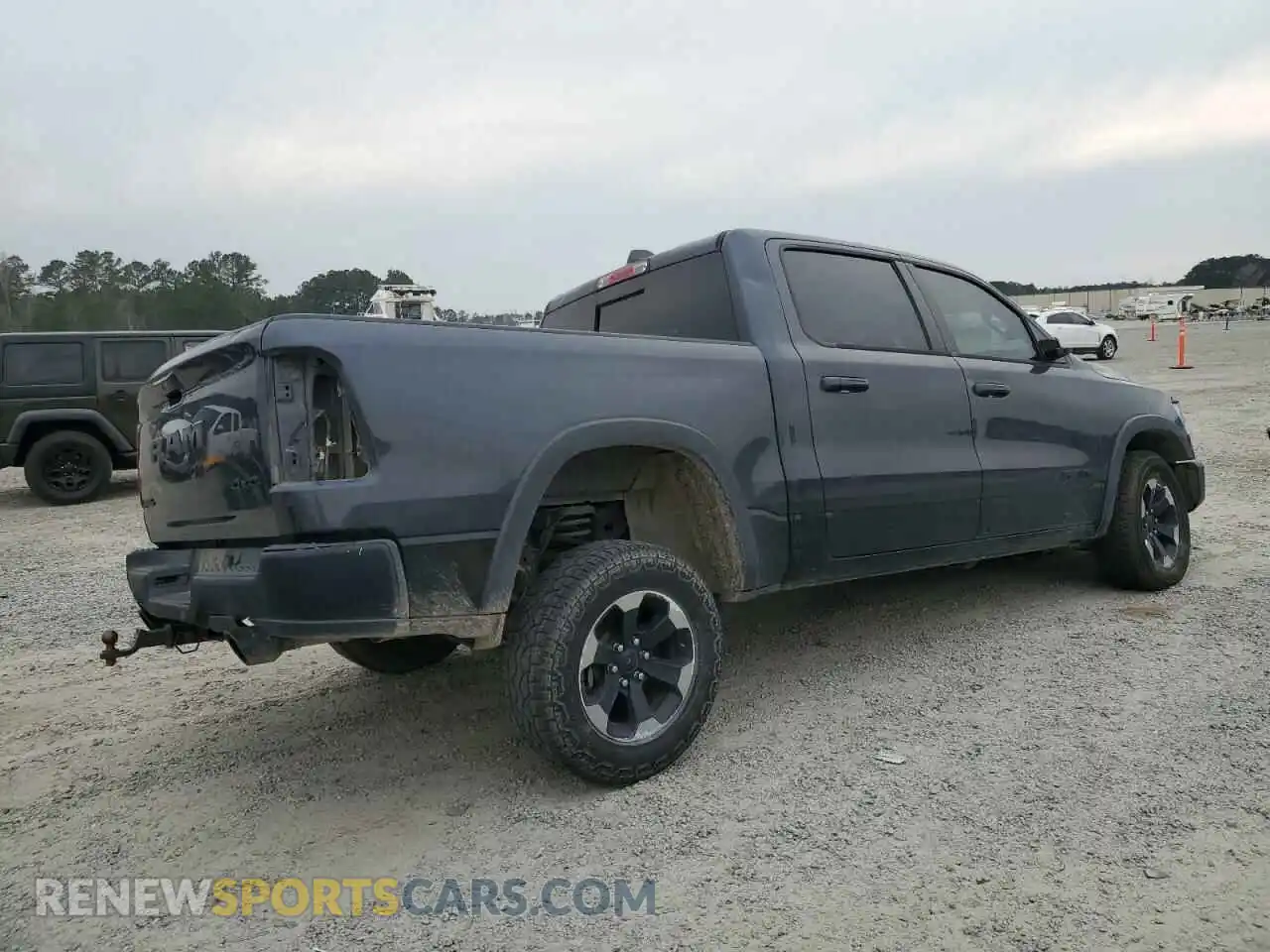 3 Photograph of a damaged car 1C6SRFLT0KN844950 RAM 1500 2019