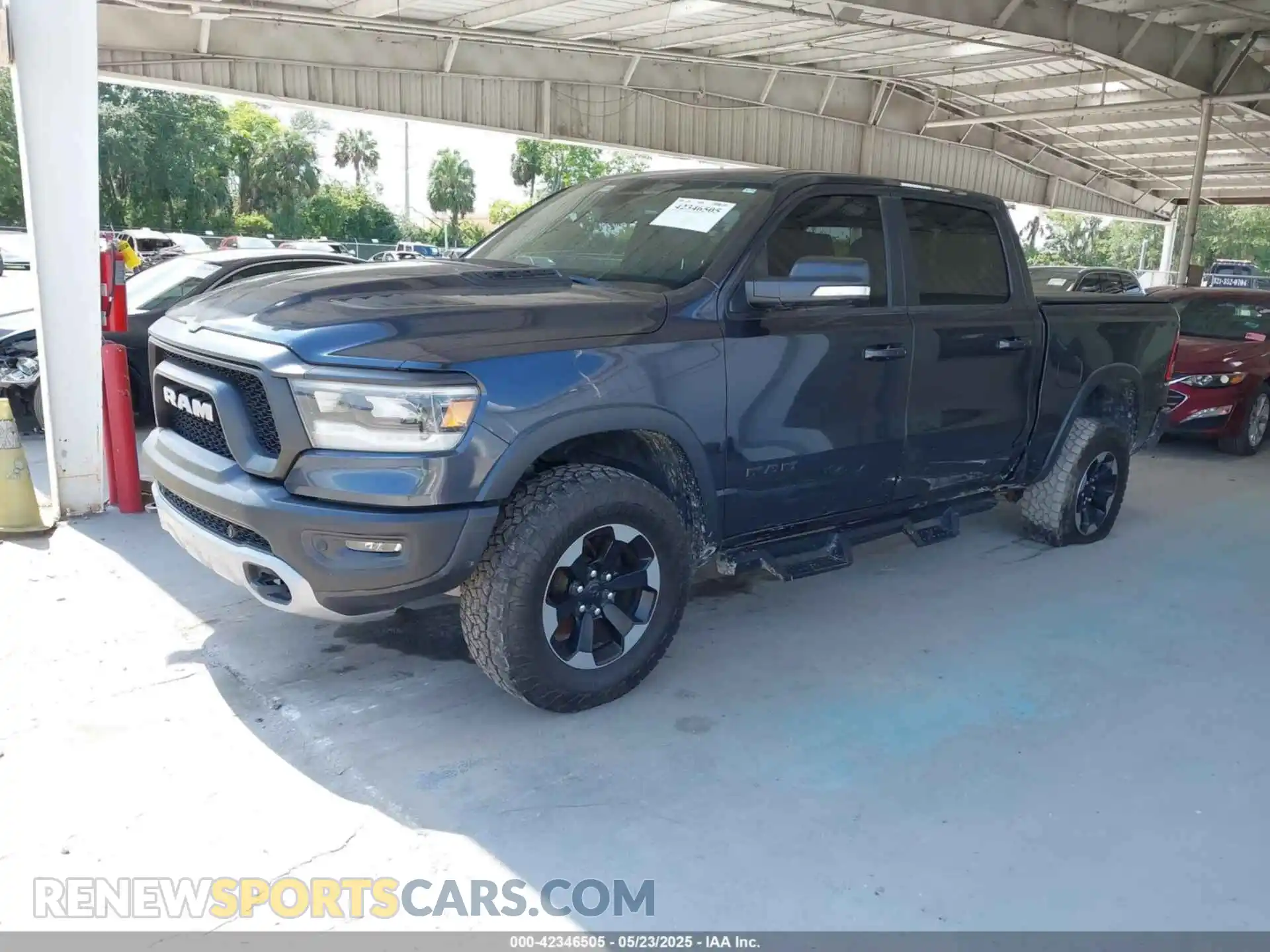 2 Photograph of a damaged car 1C6SRFLT1KN560260 RAM 1500 2019