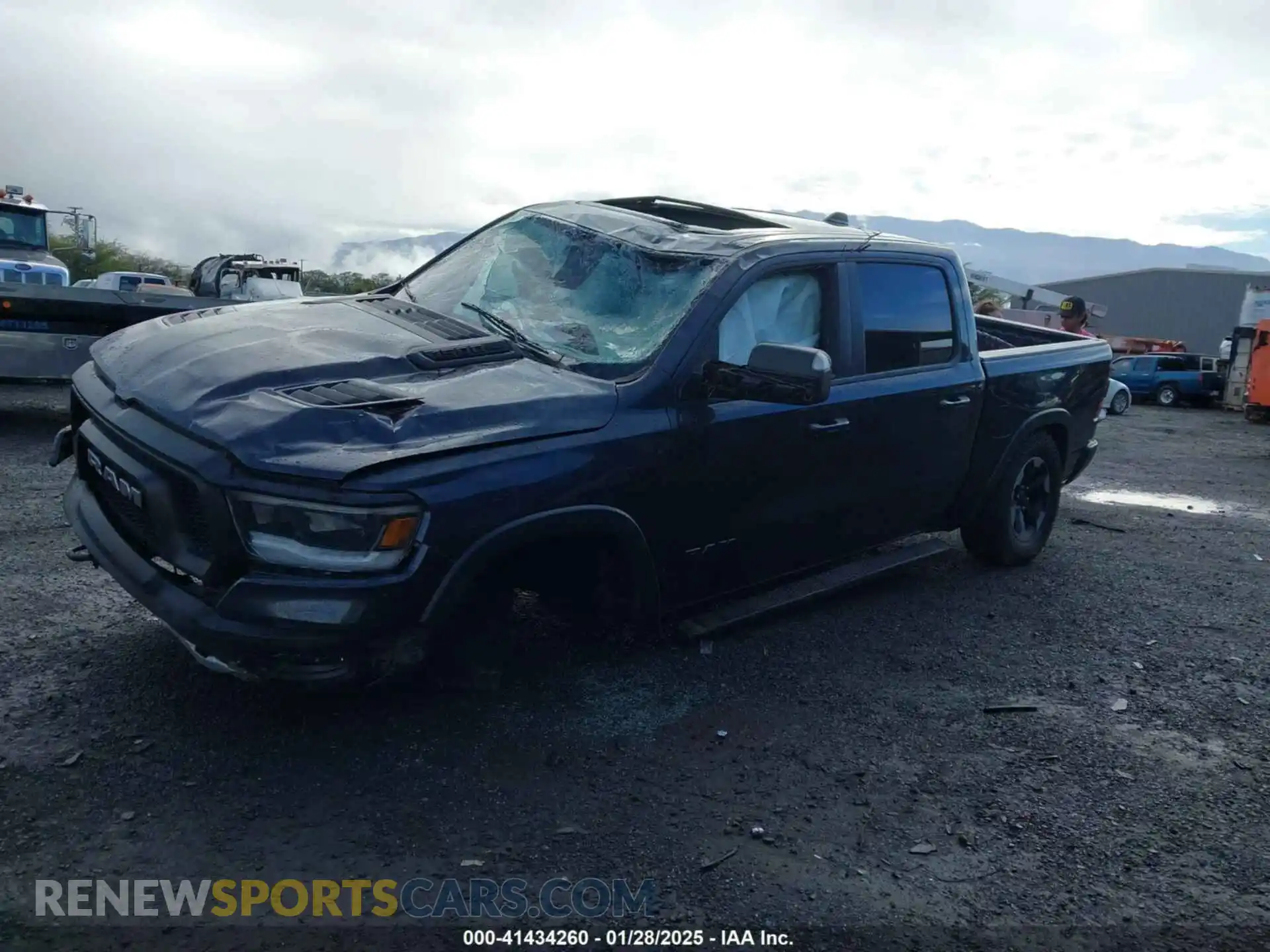 2 Photograph of a damaged car 1C6SRFLT1KN570190 RAM 1500 2019