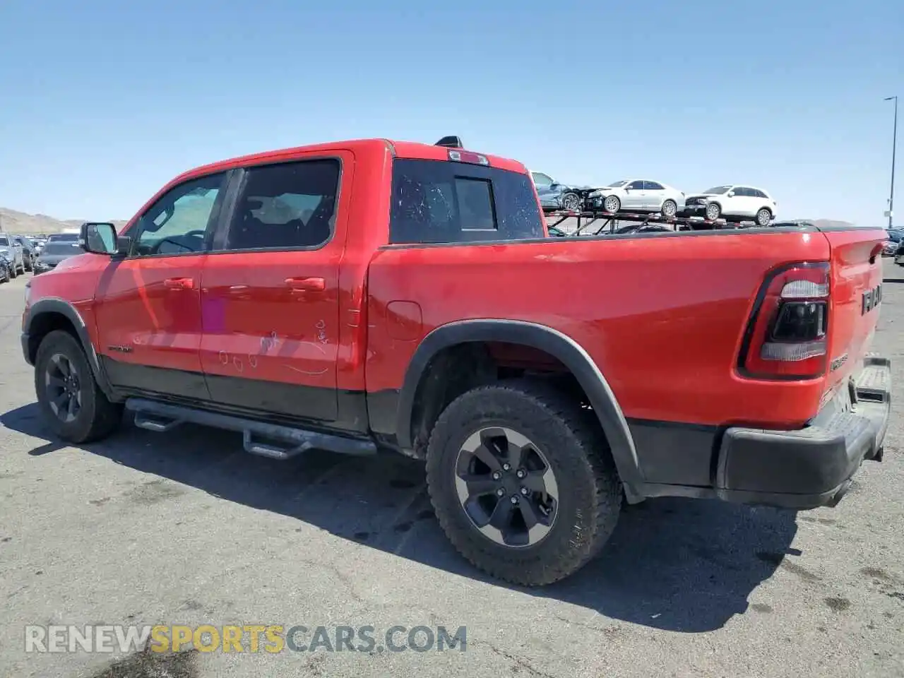 2 Photograph of a damaged car 1C6SRFLT1KN759647 RAM 1500 2019