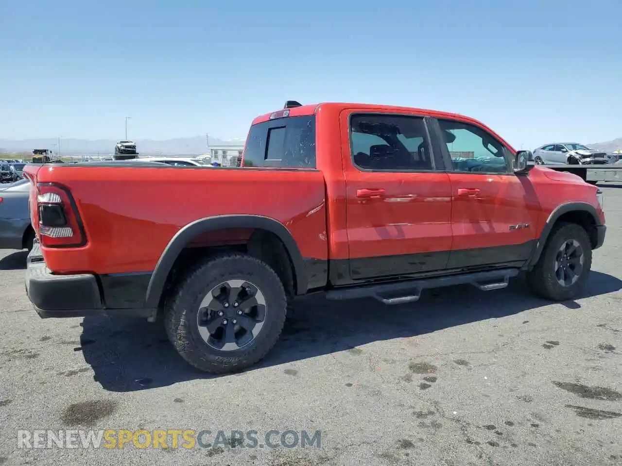 3 Photograph of a damaged car 1C6SRFLT1KN759647 RAM 1500 2019