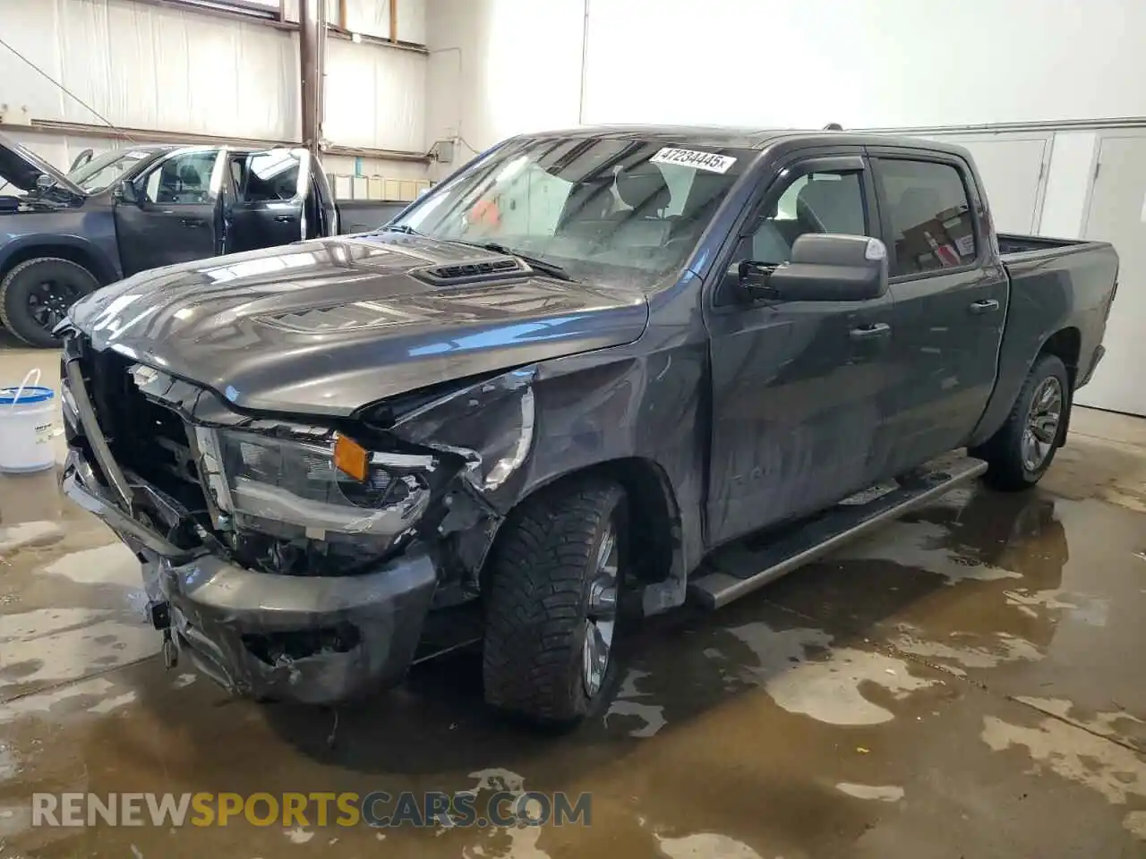 1 Photograph of a damaged car 1C6SRFLT2KN551986 RAM 1500 2019