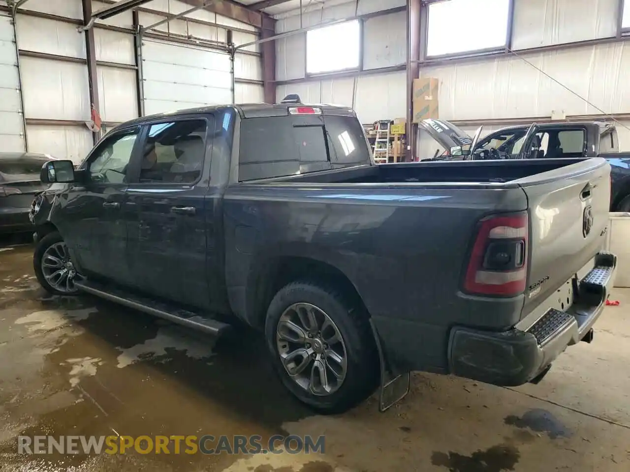 2 Photograph of a damaged car 1C6SRFLT2KN551986 RAM 1500 2019