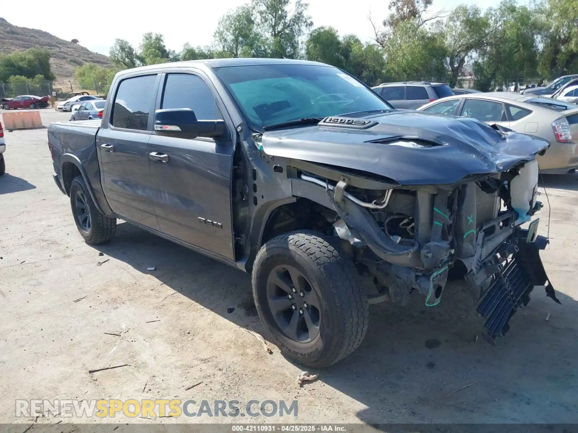 1 Photograph of a damaged car 1C6SRFLT2KN696557 RAM 1500 2019