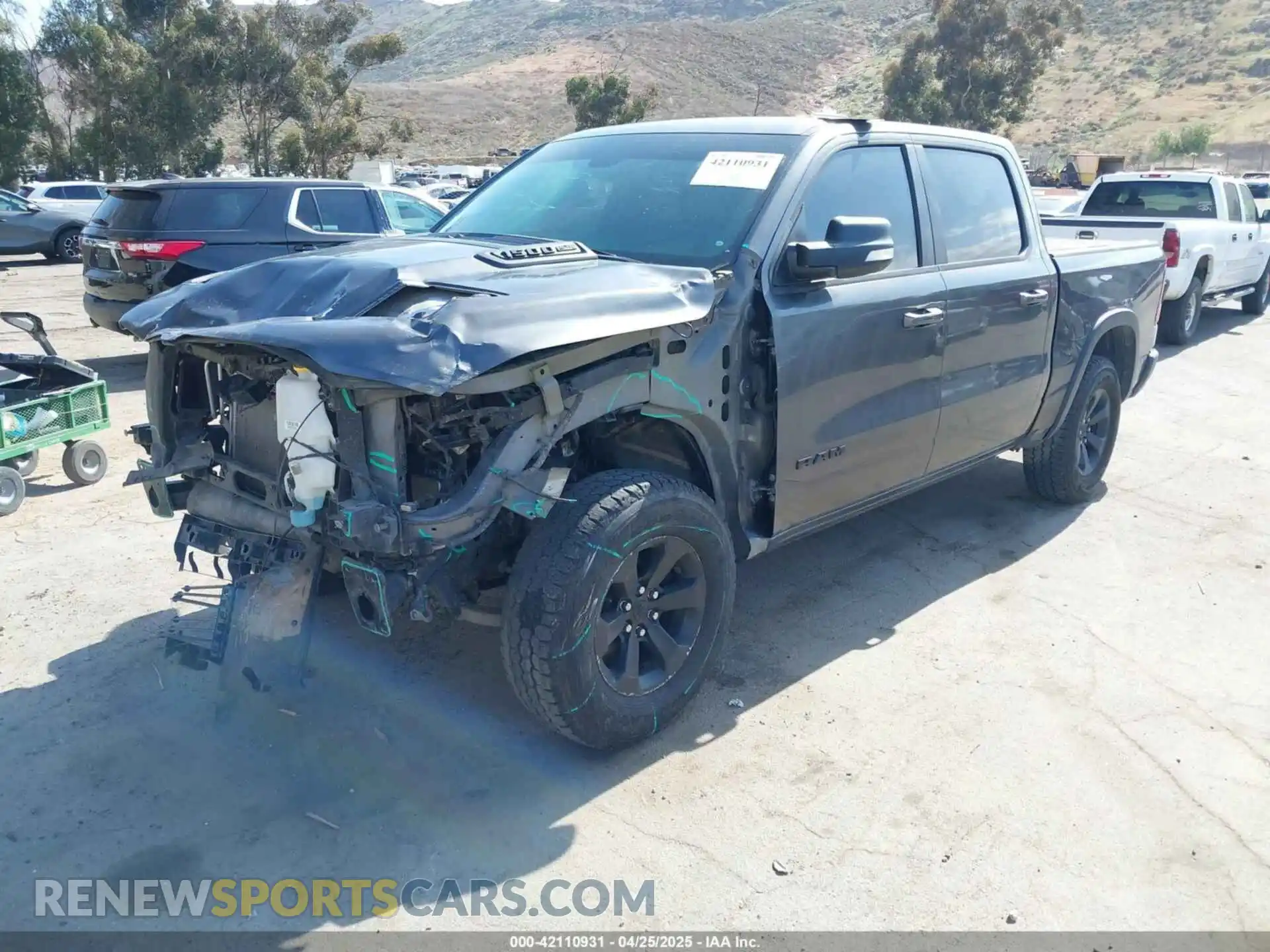 2 Photograph of a damaged car 1C6SRFLT2KN696557 RAM 1500 2019