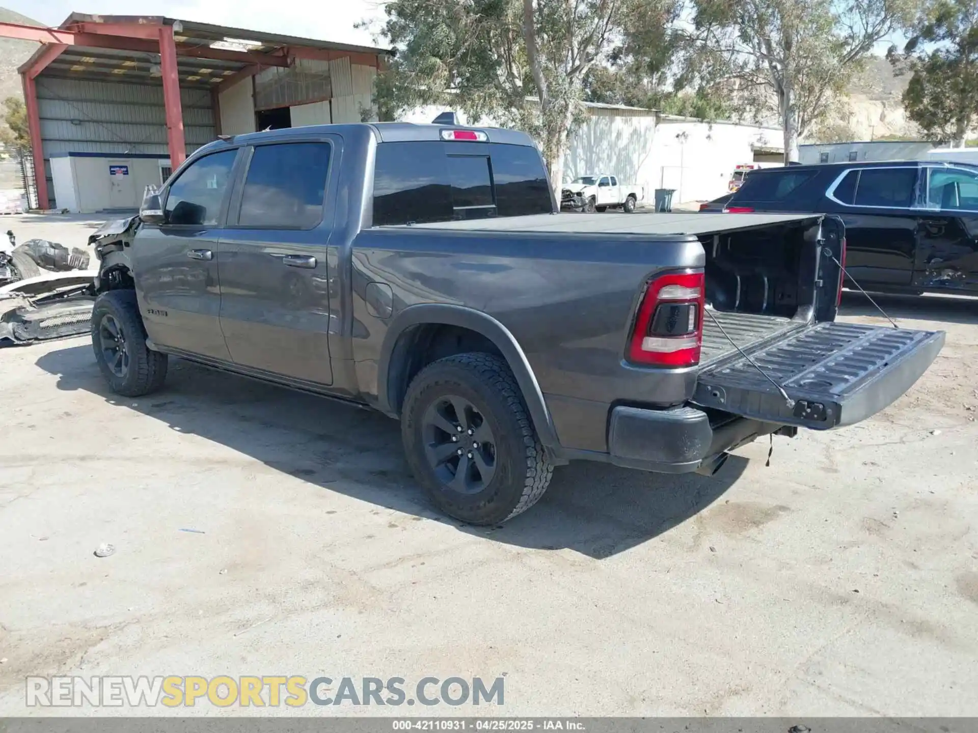 3 Photograph of a damaged car 1C6SRFLT2KN696557 RAM 1500 2019