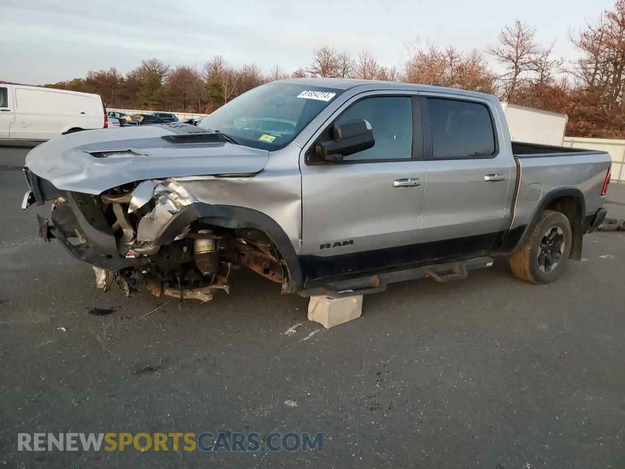 1 Photograph of a damaged car 1C6SRFLT2KN698535 RAM 1500 2019