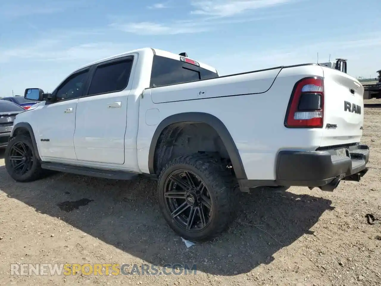 2 Photograph of a damaged car 1C6SRFLT2KN722445 RAM 1500 2019