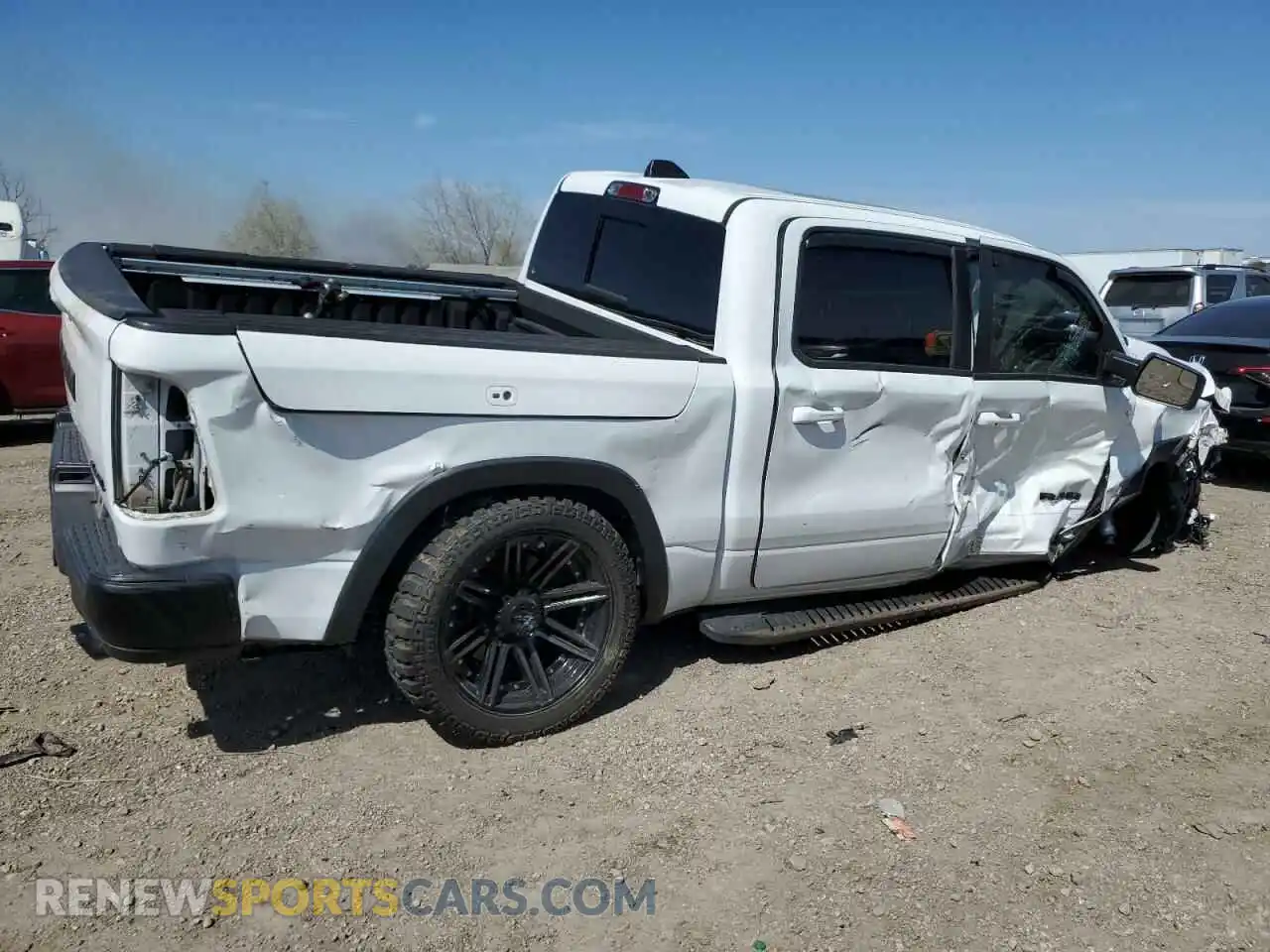3 Photograph of a damaged car 1C6SRFLT2KN722445 RAM 1500 2019