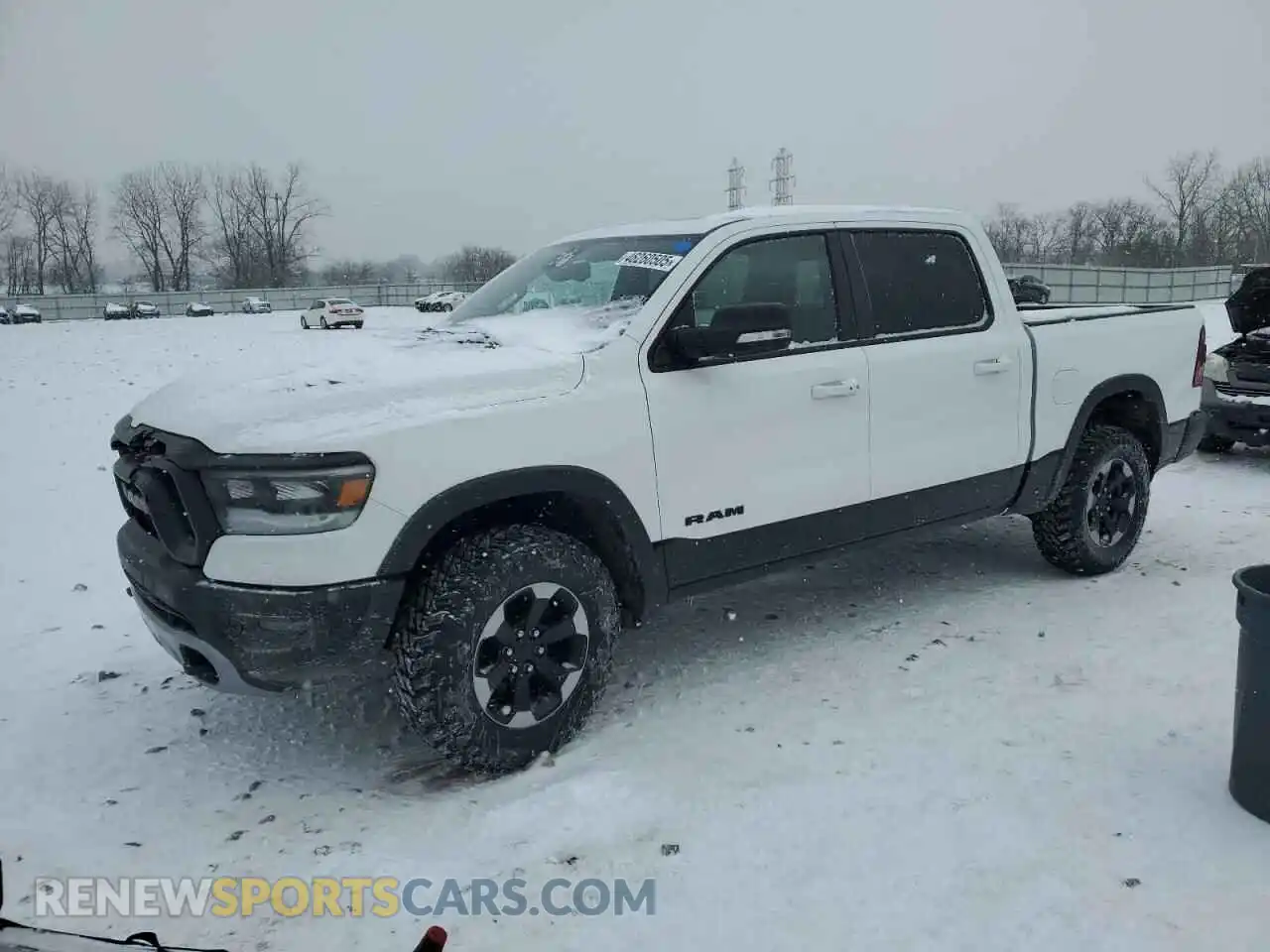1 Photograph of a damaged car 1C6SRFLT3KN537529 RAM 1500 2019