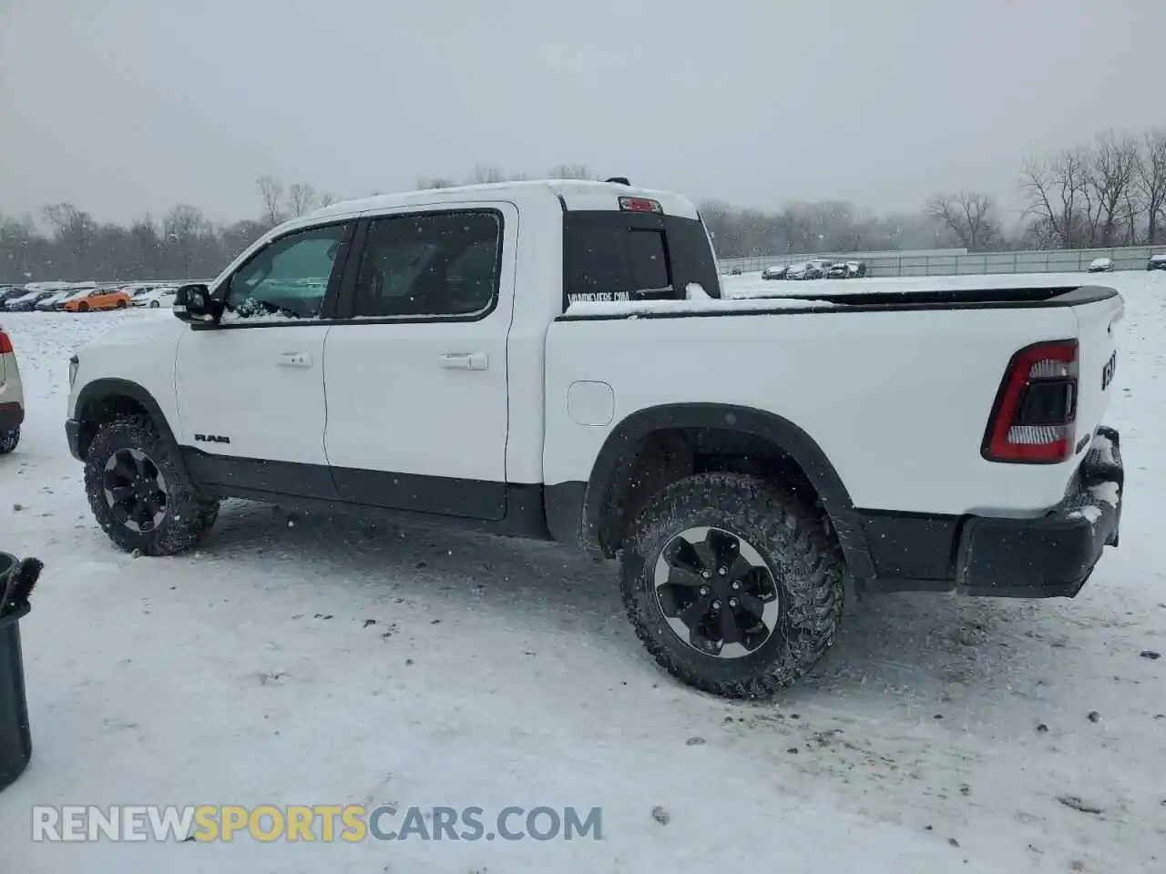 2 Photograph of a damaged car 1C6SRFLT3KN537529 RAM 1500 2019