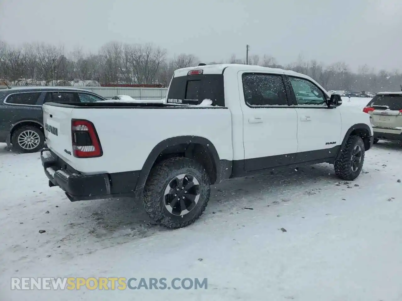 3 Photograph of a damaged car 1C6SRFLT3KN537529 RAM 1500 2019