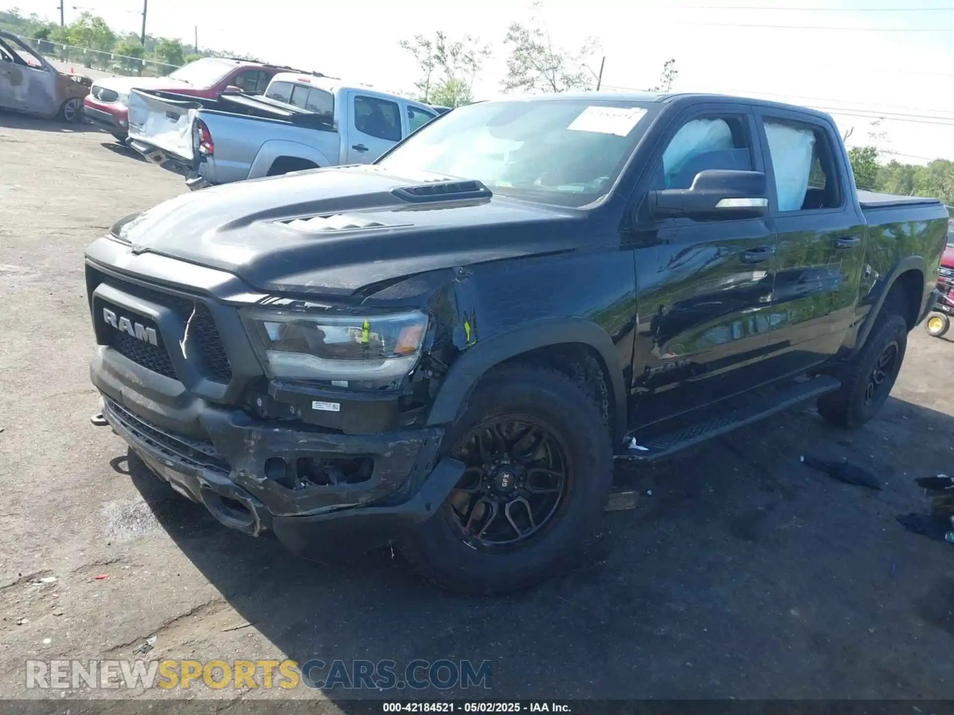2 Photograph of a damaged car 1C6SRFLT3KN630552 RAM 1500 2019