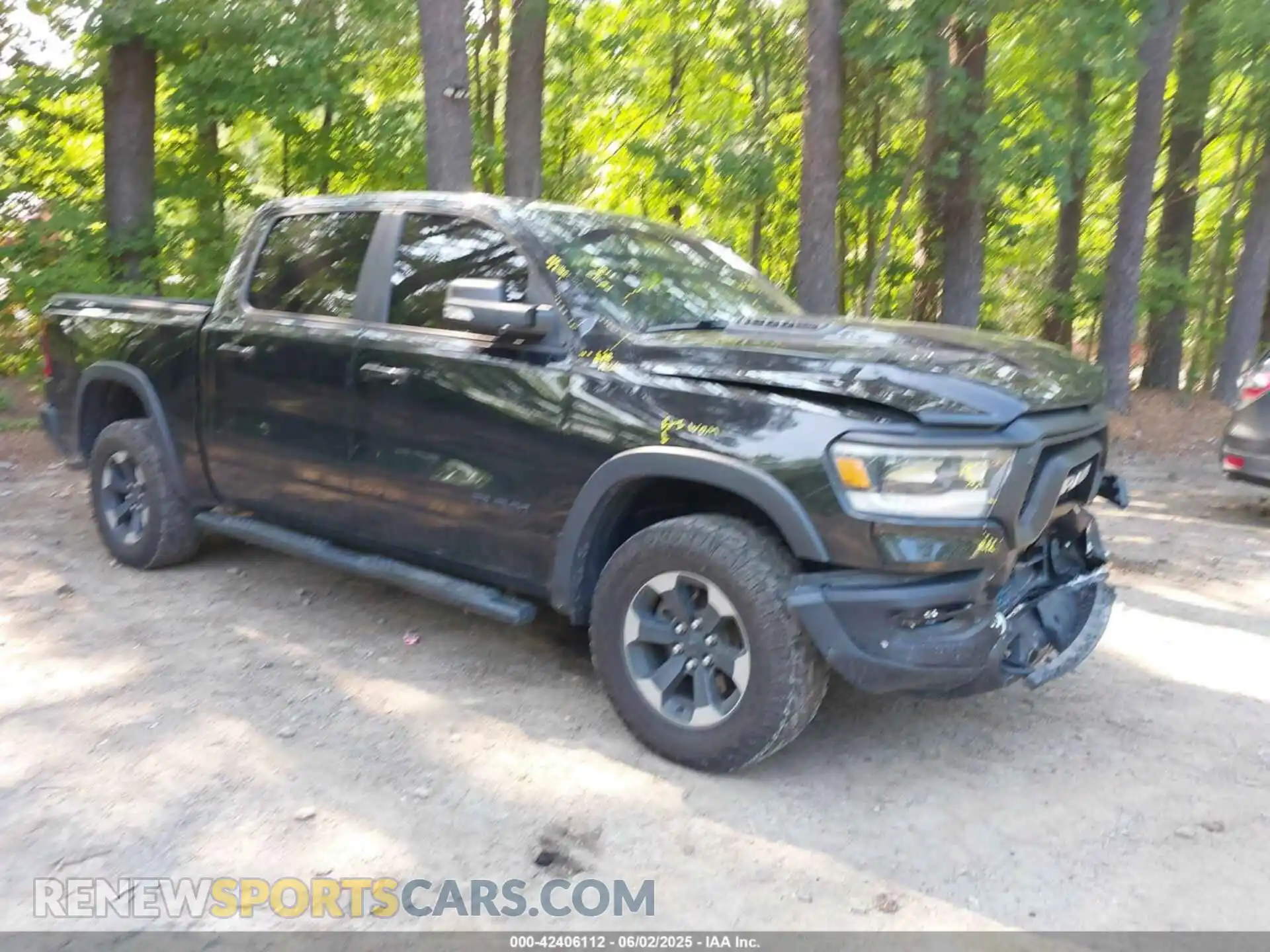 1 Photograph of a damaged car 1C6SRFLT5KN652309 RAM 1500 2019