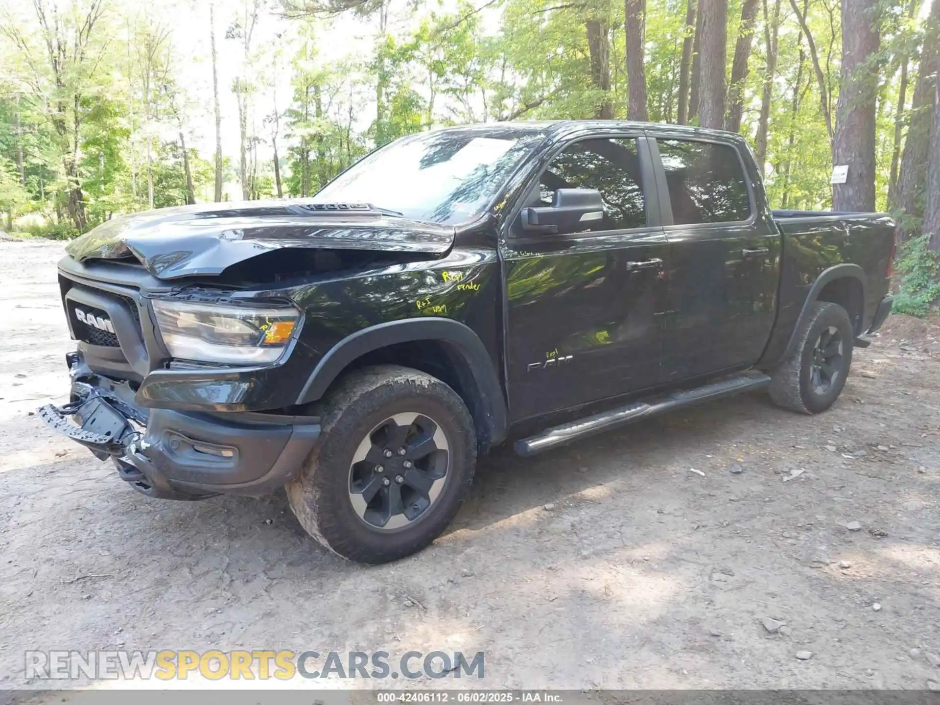 2 Photograph of a damaged car 1C6SRFLT5KN652309 RAM 1500 2019