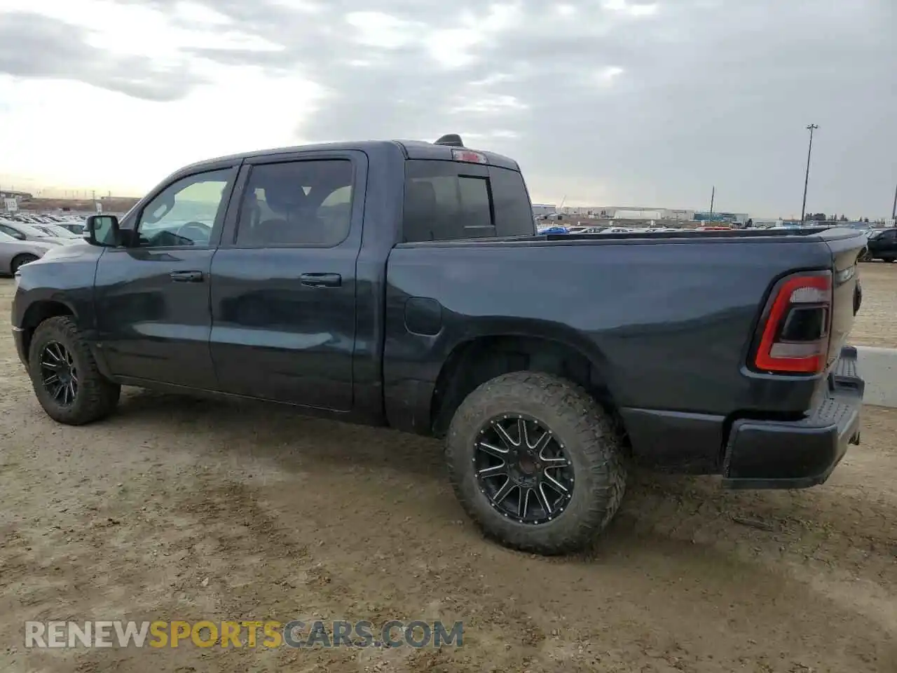 2 Photograph of a damaged car 1C6SRFLT5KN743550 RAM 1500 2019